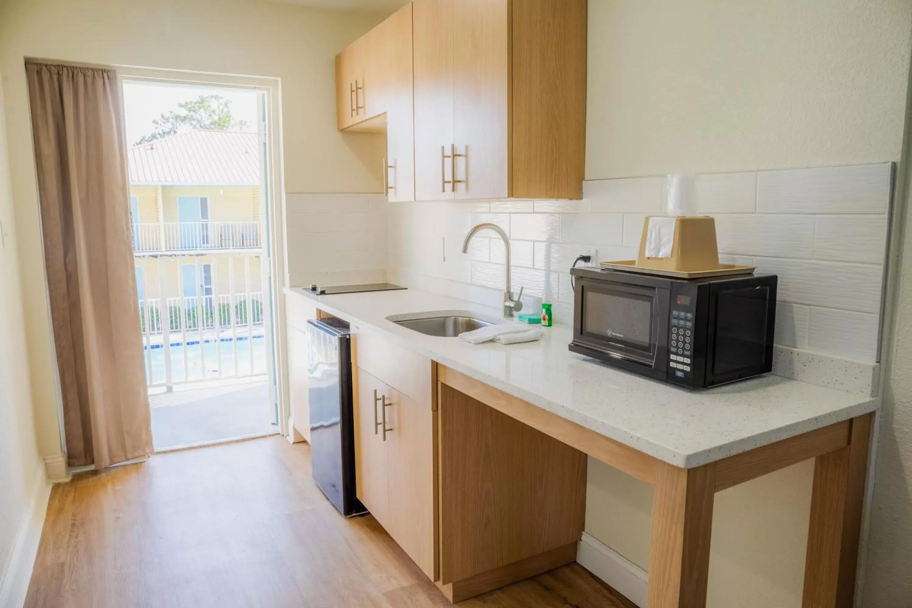 Kitchen or kitchenette, Kitchen/Kitchenette in Dunes Inn & Suites - Tybee Island