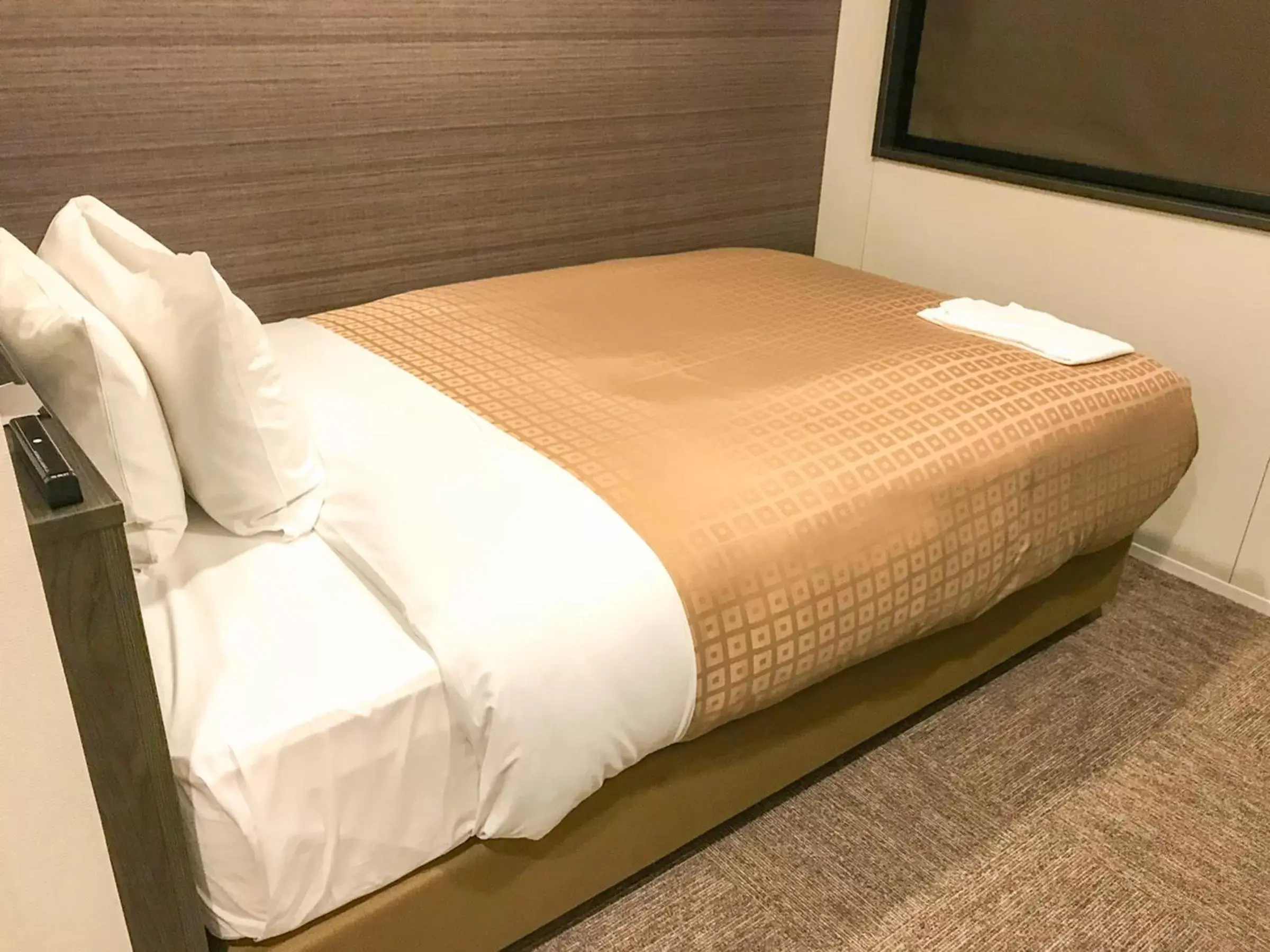 Bed in Hotel Livemax Toyama