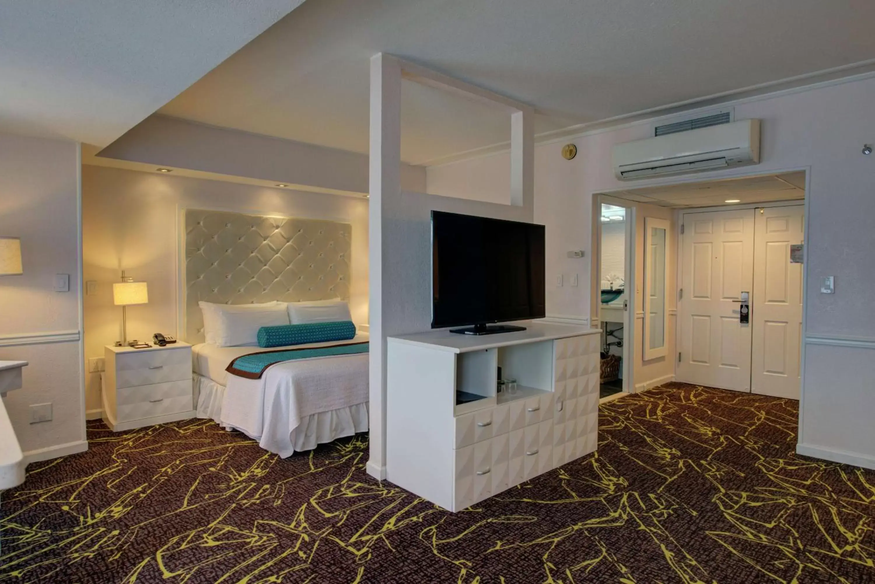 Bed, TV/Entertainment Center in The Roslyn, Tapestry Collection by Hilton