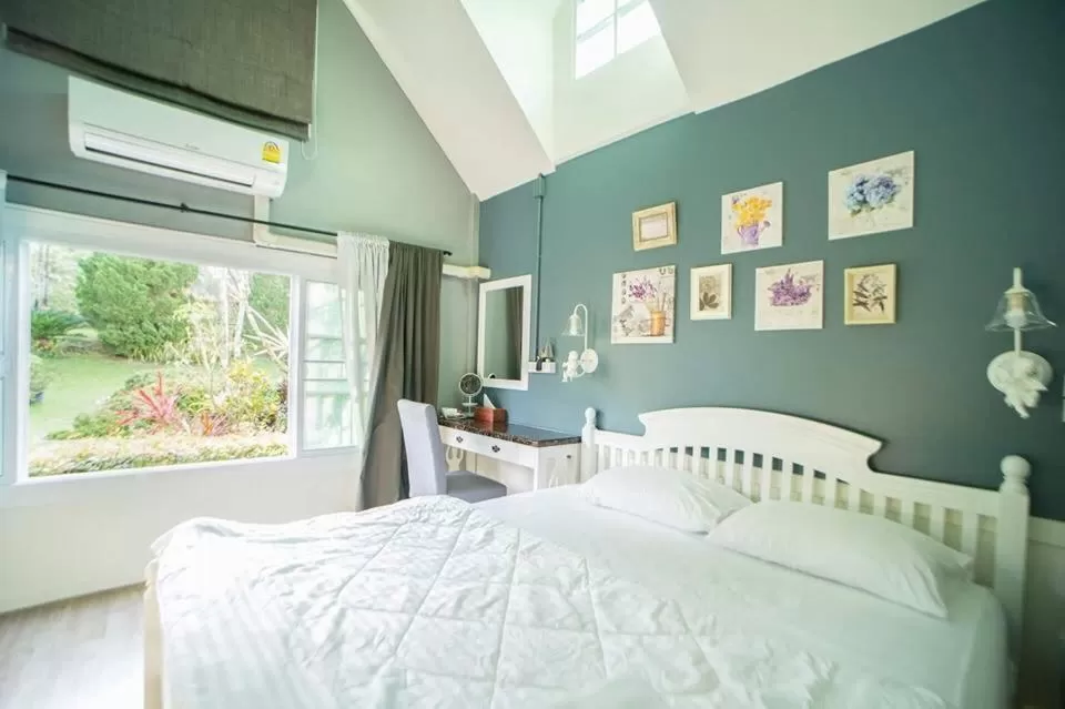 Bed in Baan JaoKorKluay บ้านเจ้ากอกล้วย