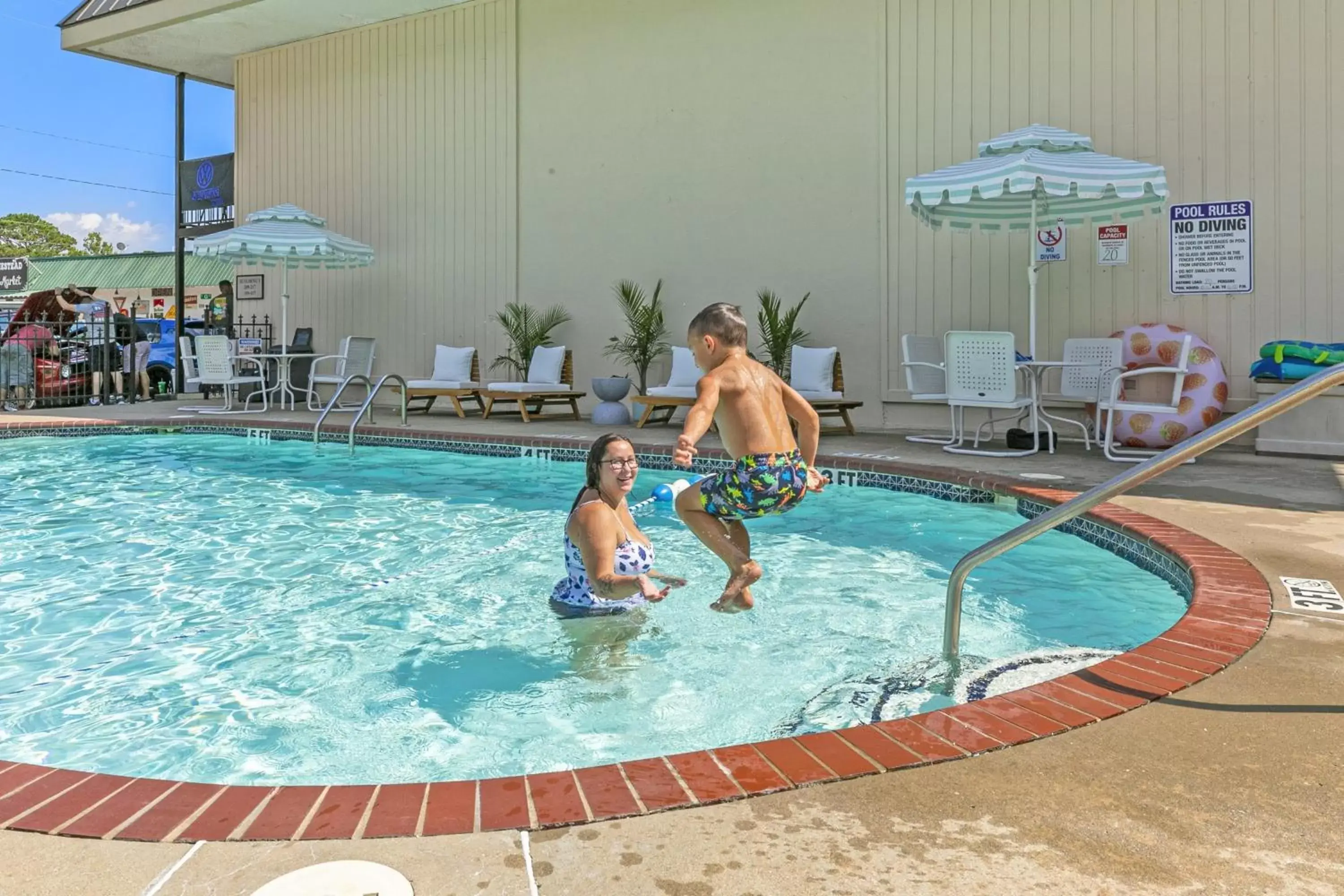 People, Swimming Pool in Candlewick Inn and Suites