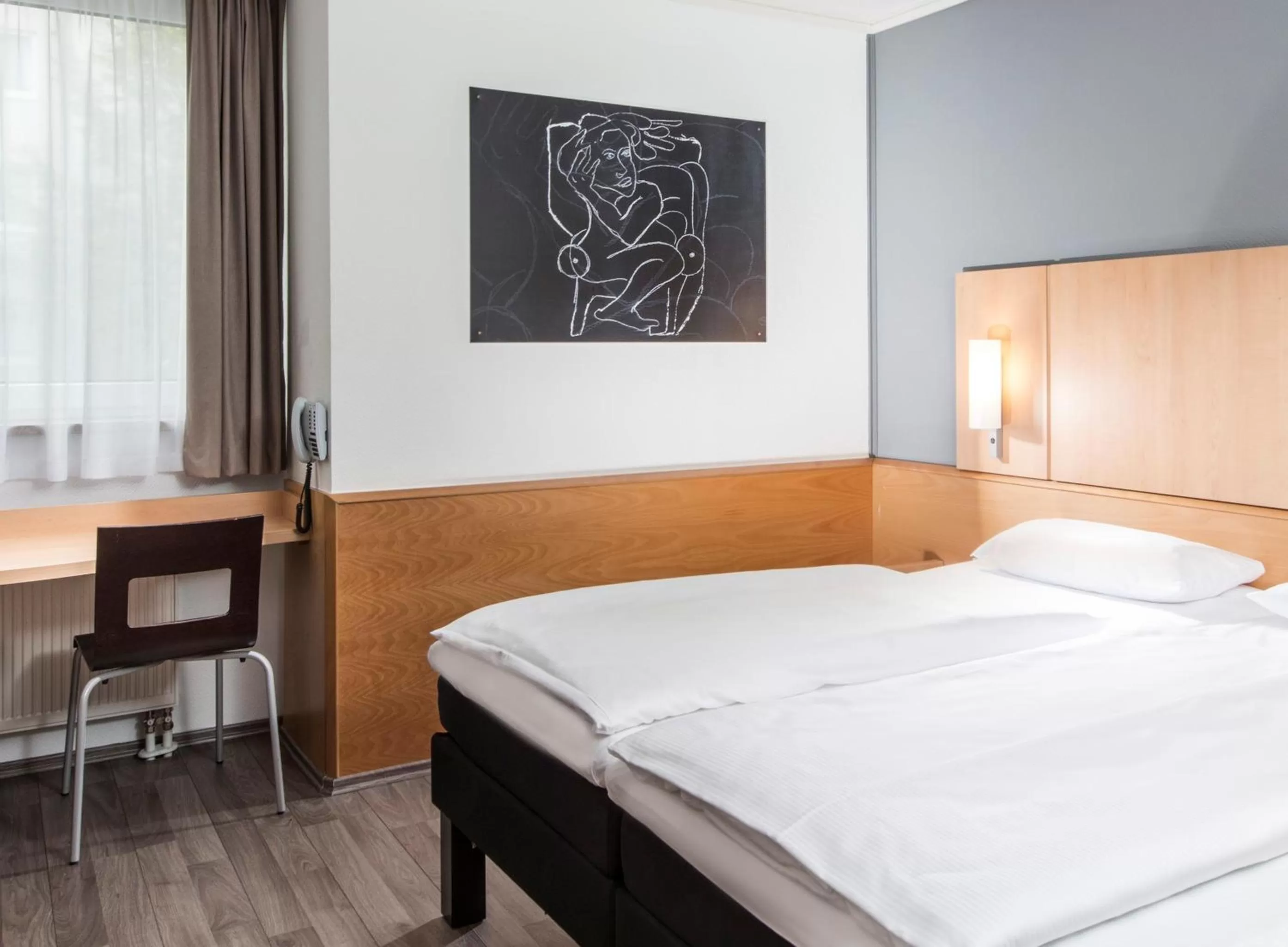 Photo of the whole room, Bed in ibis Leipzig Nord-Ost