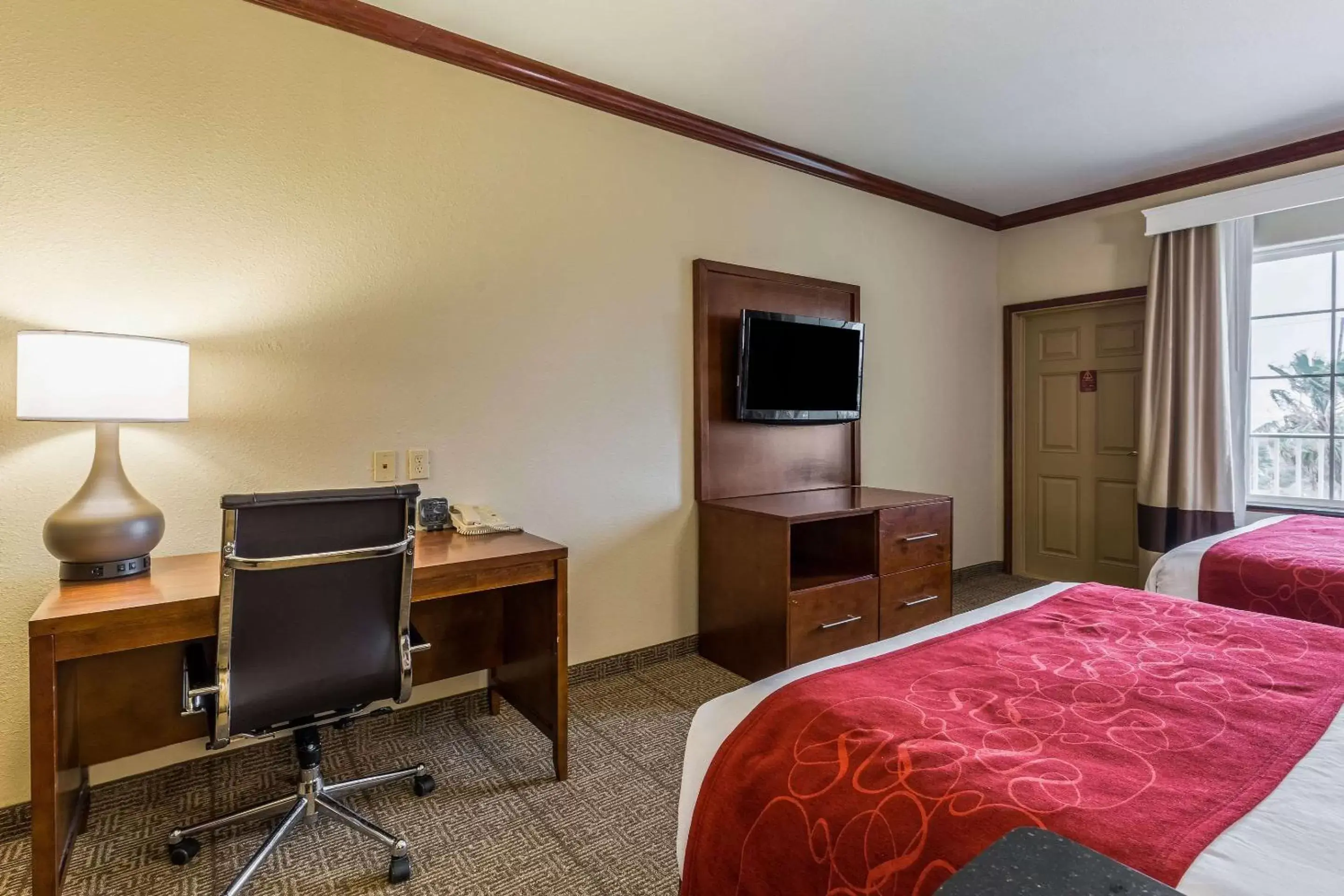 Photo of the whole room, TV/Entertainment Center in Comfort Suites Galveston