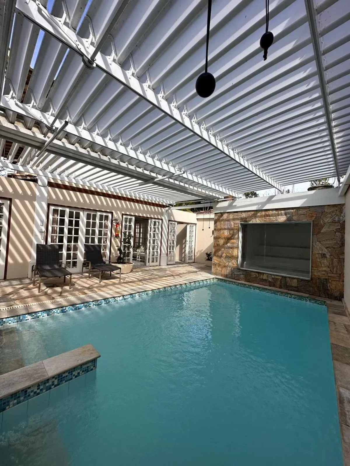 Swimming pool in Pousada Corsario Buzios