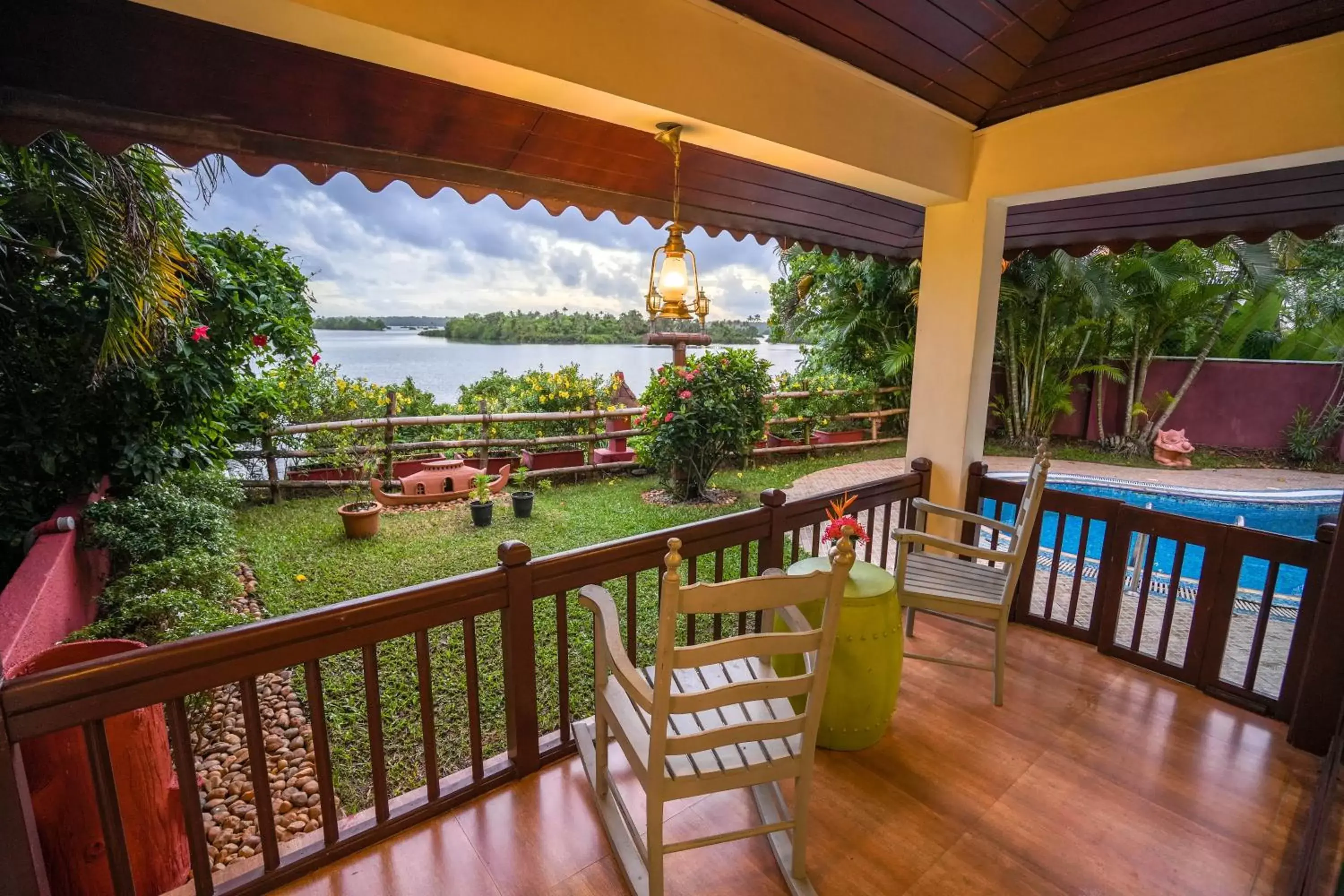 Balcony/Terrace, Pool View in Fragrant Nature Backwater Resort & Ayurveda Spa Kollam