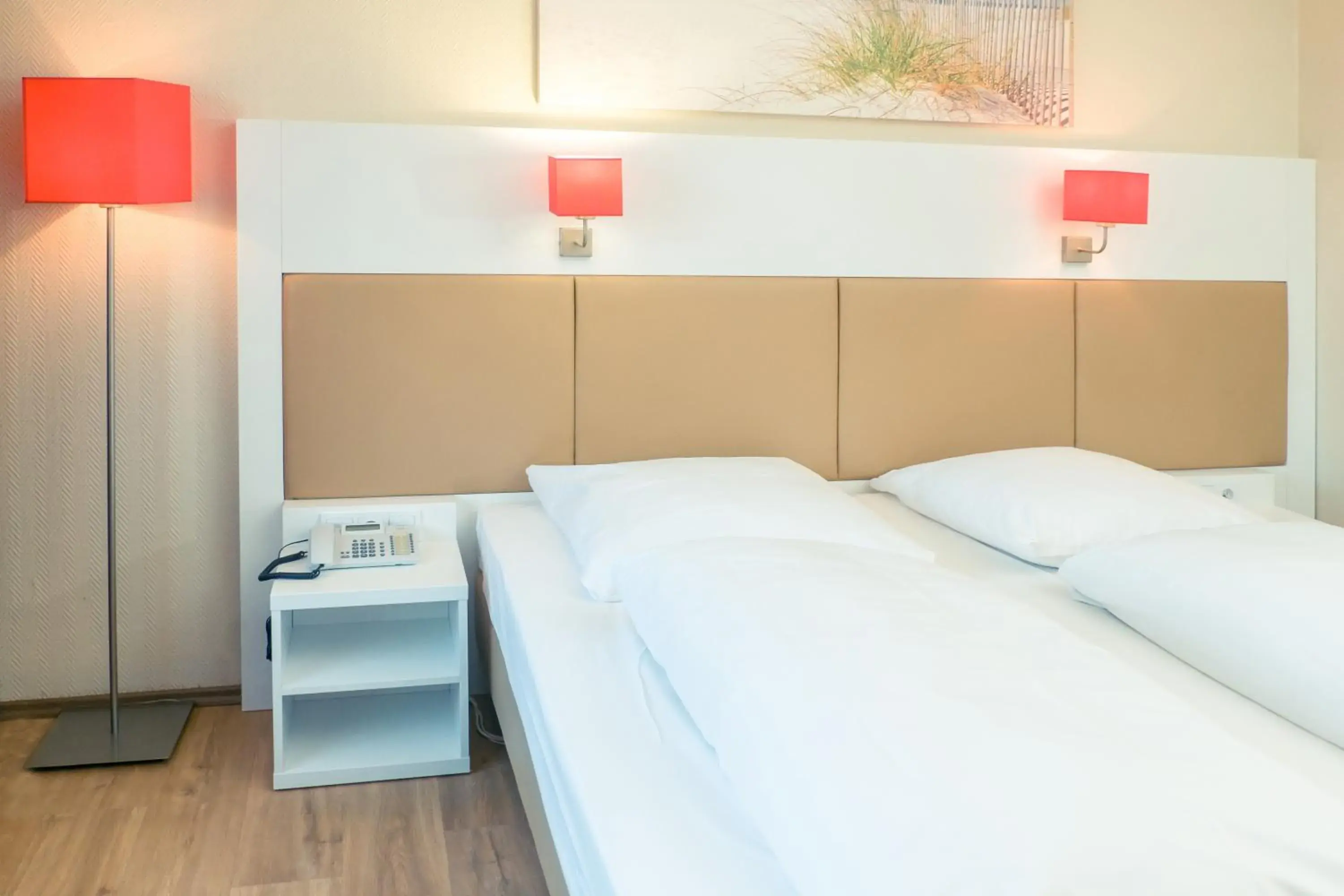 Photo of the whole room, Bed in Hotel Stuttgart Sindelfingen City by Tulip Inn