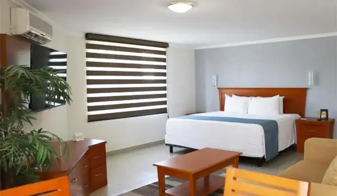 Photo of the whole room, Bed in Araiza Palmira Hotel y Centro de Convenciones
