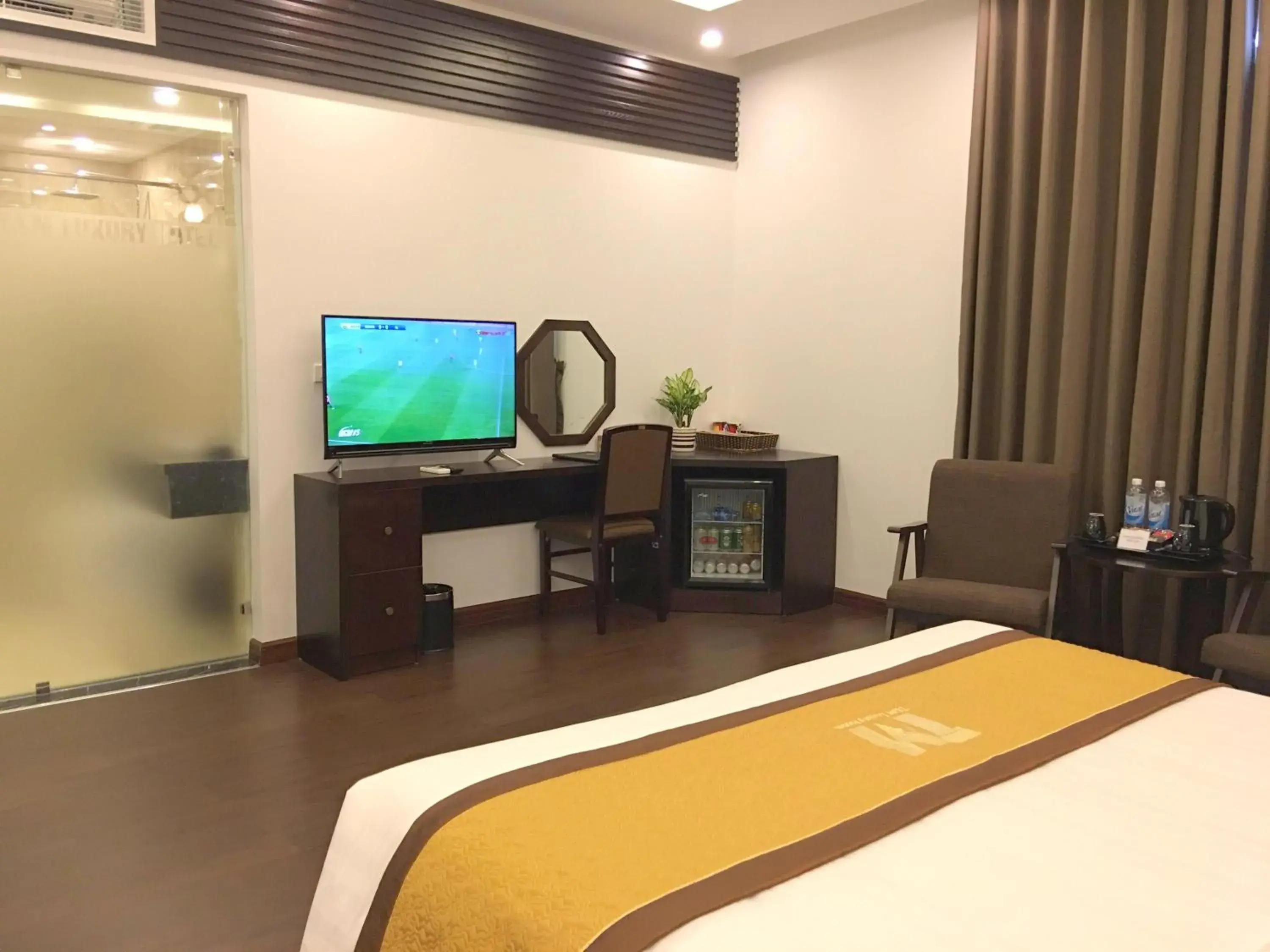 Bedroom, TV/Entertainment Center in T&M Luxury Hotel Hanoi