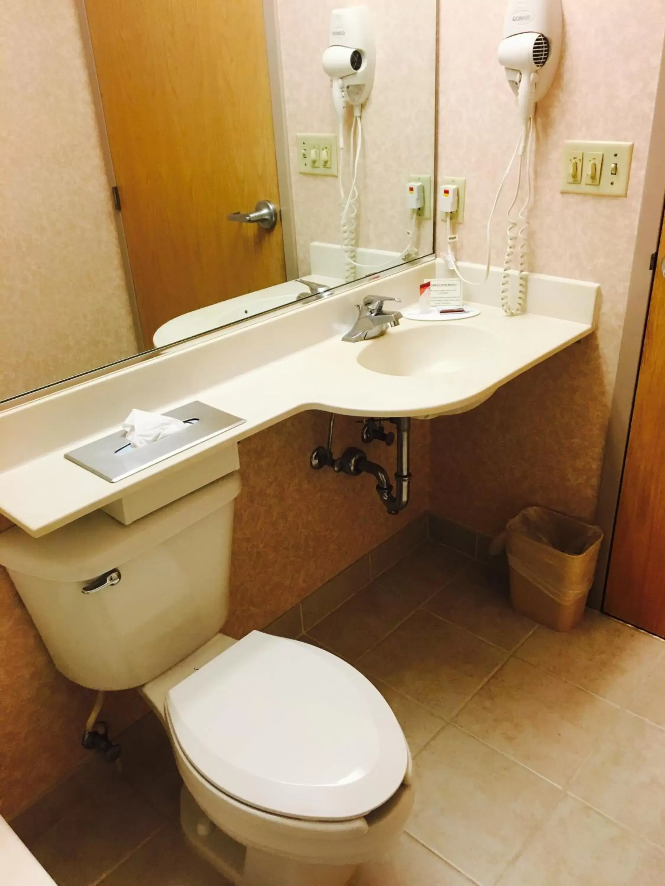 Bathroom in Microtel Inn & Suites by Wyndham Syracuse Baldwinsville