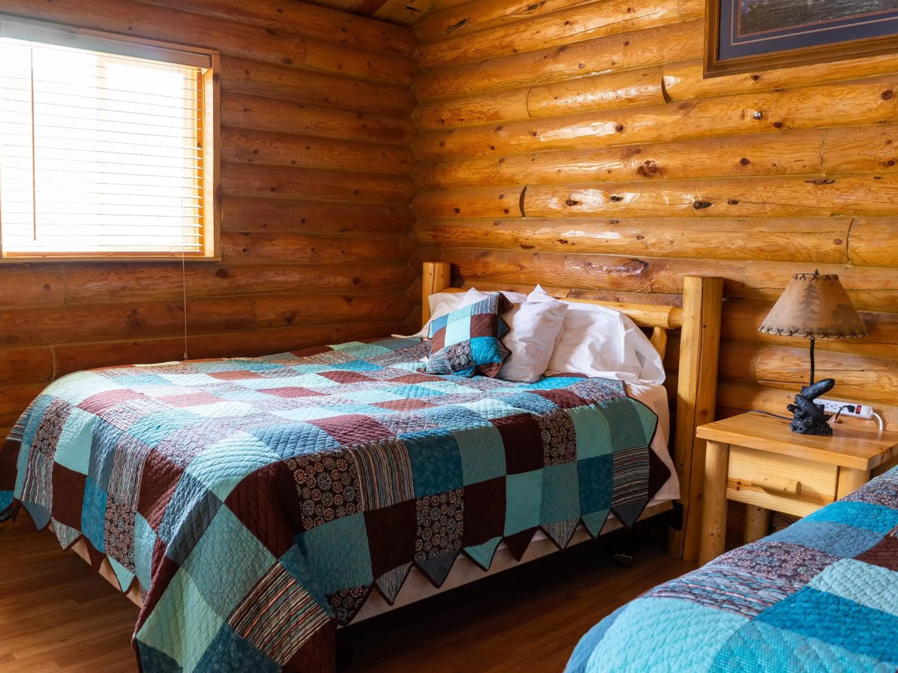 Bed in Country Cabins Inn