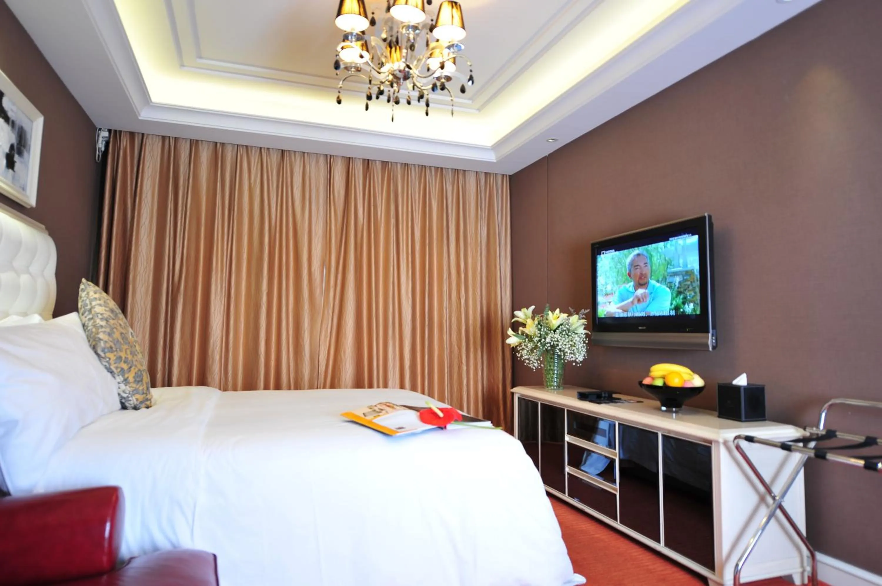 Bed in Wealthy All Suite Hotel Suzhou