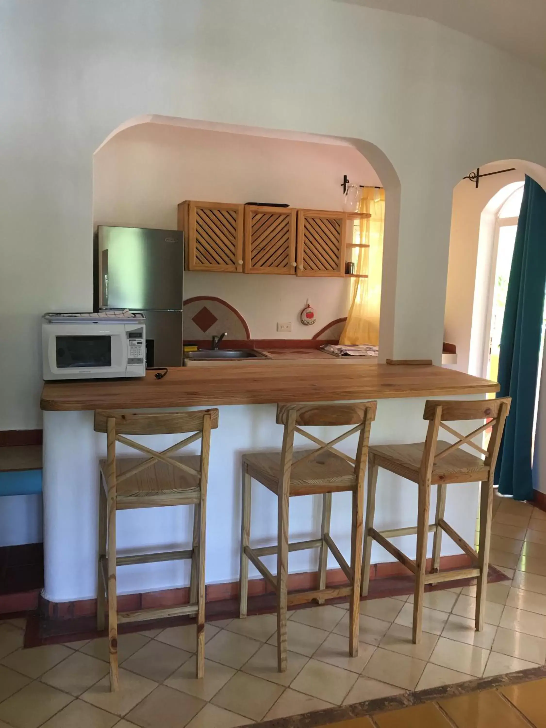 Kitchen/Kitchenette in Hotel - Residencial Madrugada