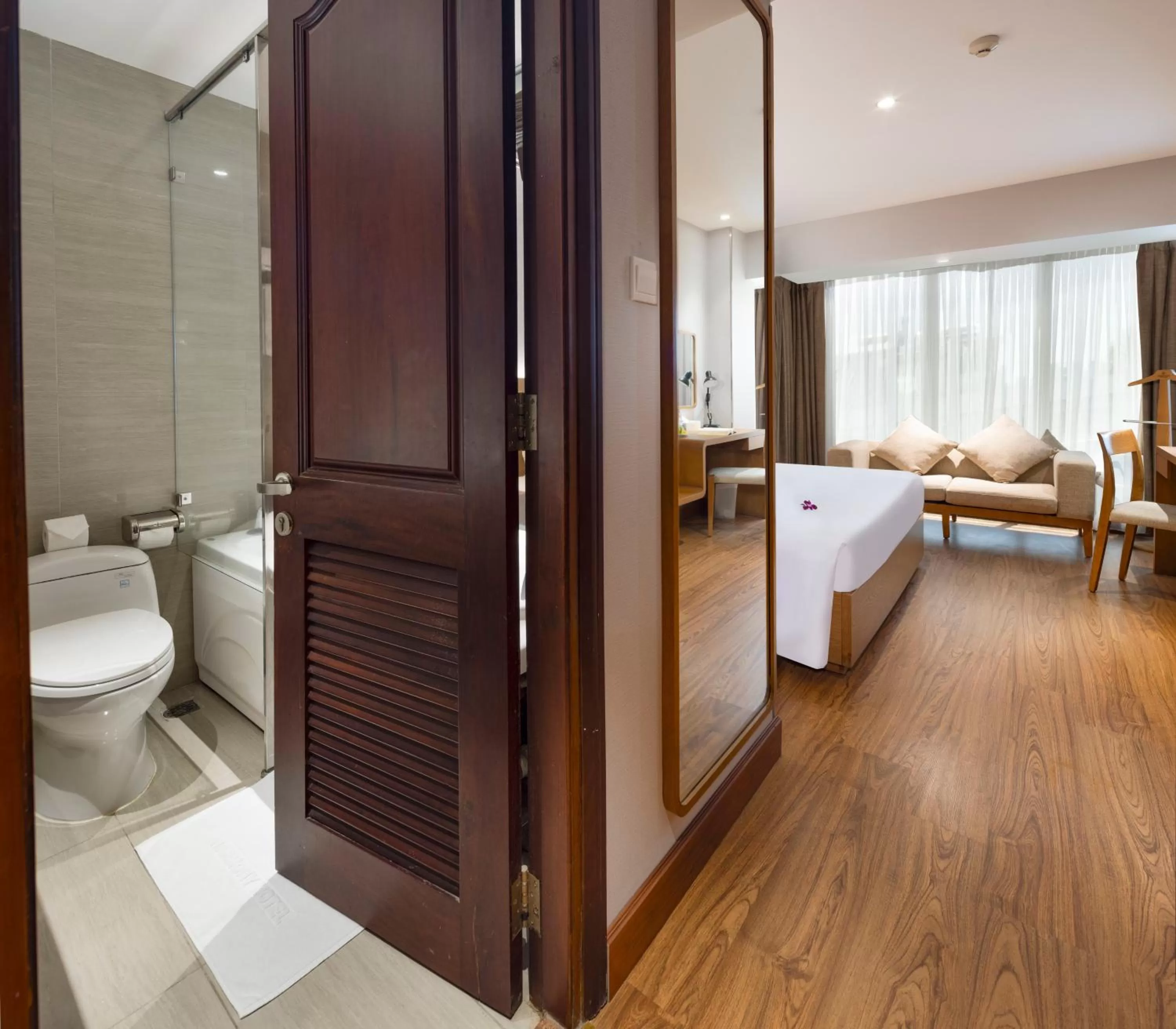 Bedroom in Harmony Saigon Hotel & Spa