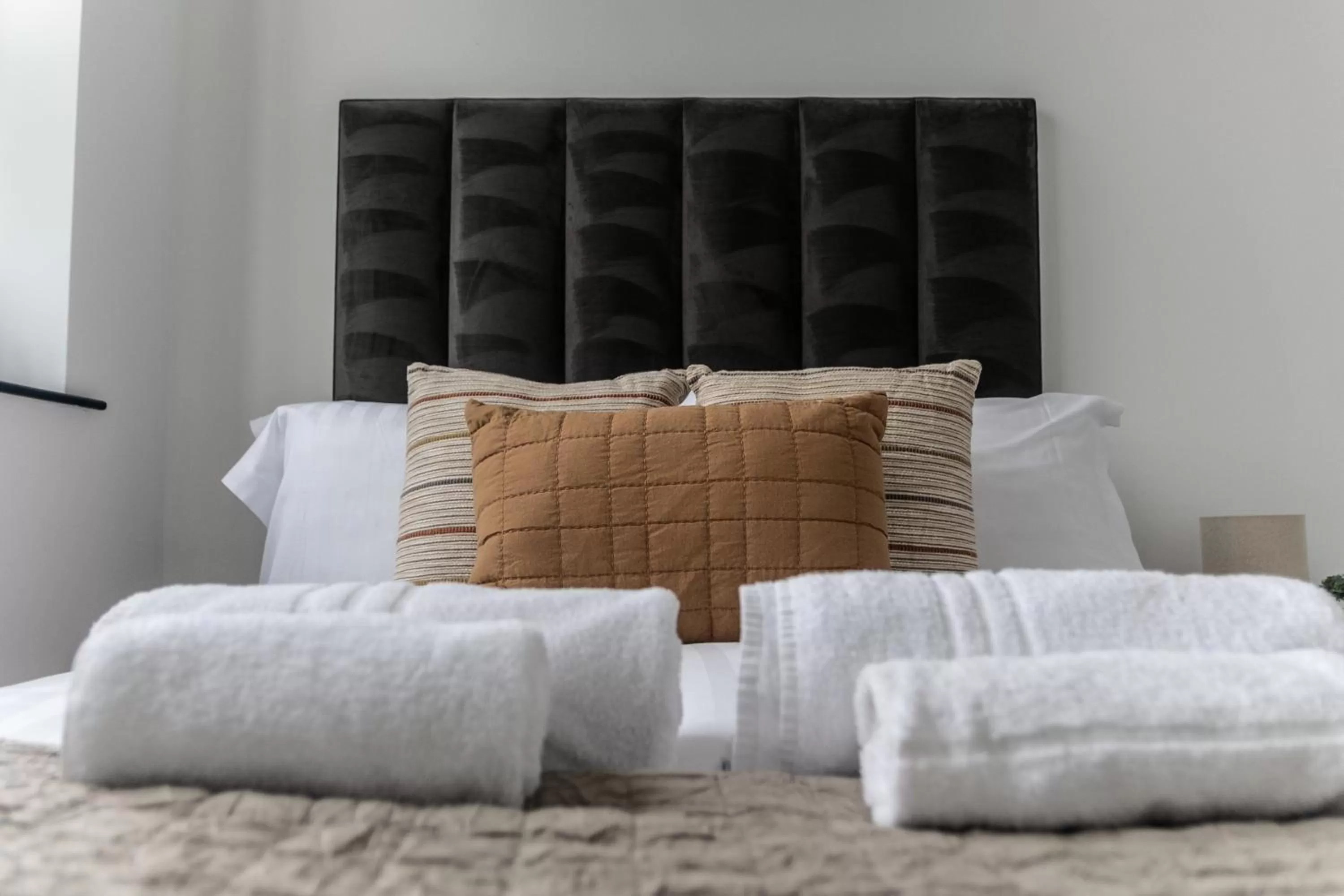 Bed in Spire Accommodations Ltd