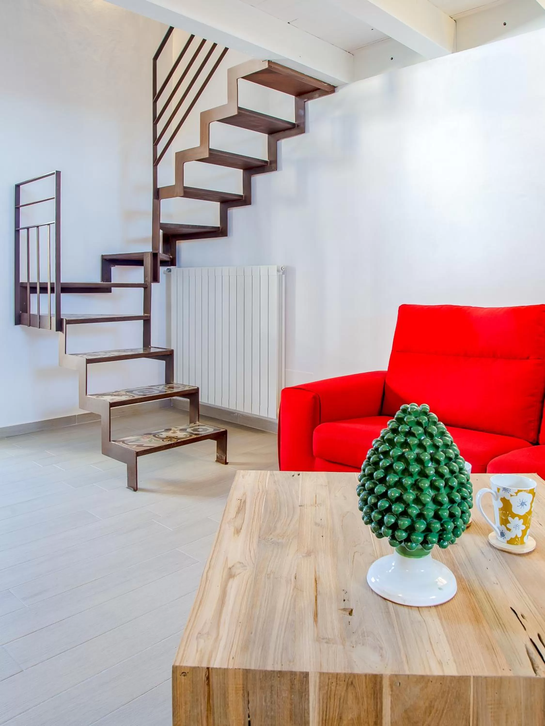 Bed in Le Maestranze Deluxe Rooms