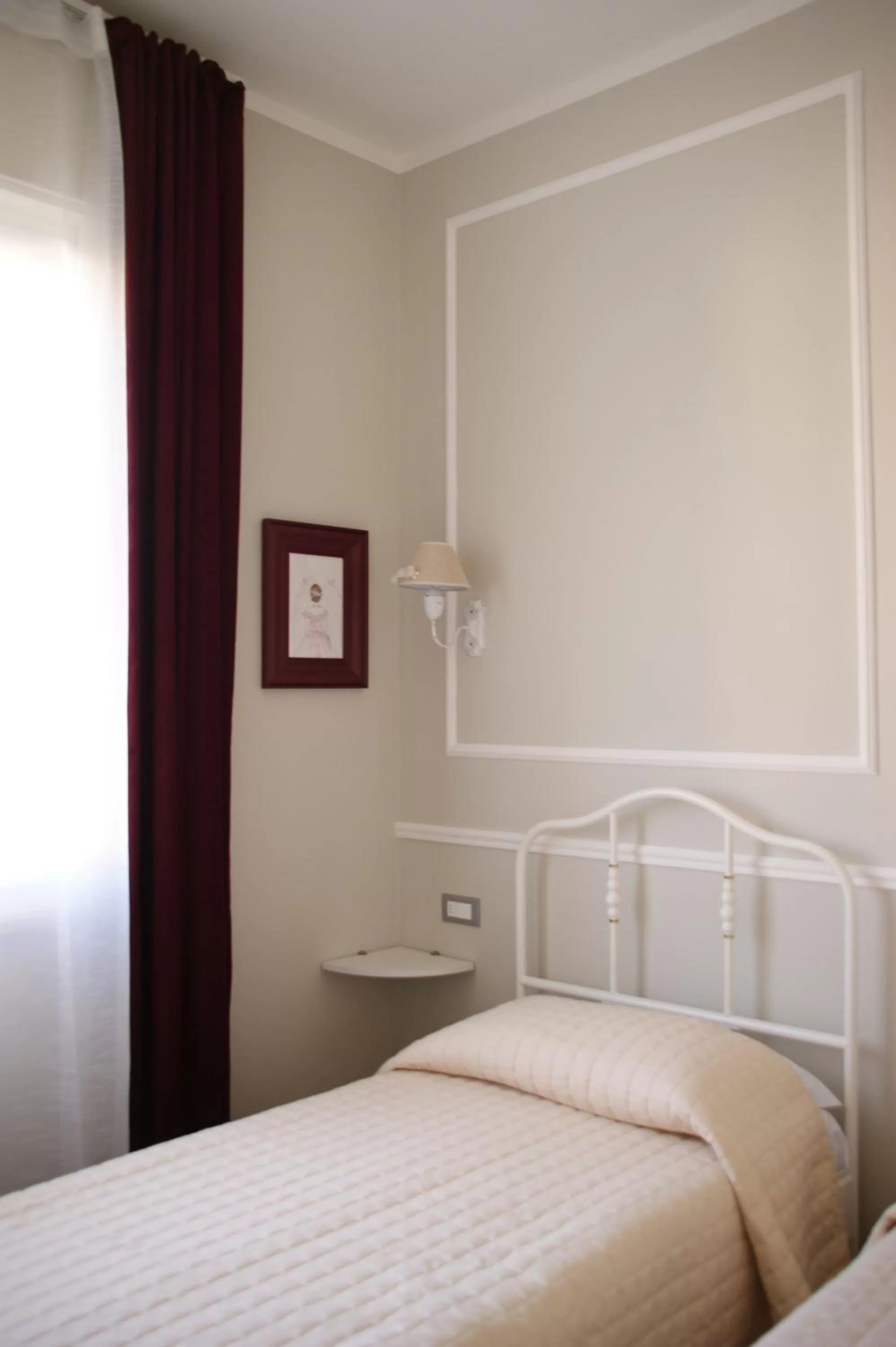 Bed in LA DAMA ROOM&BREAKFAST