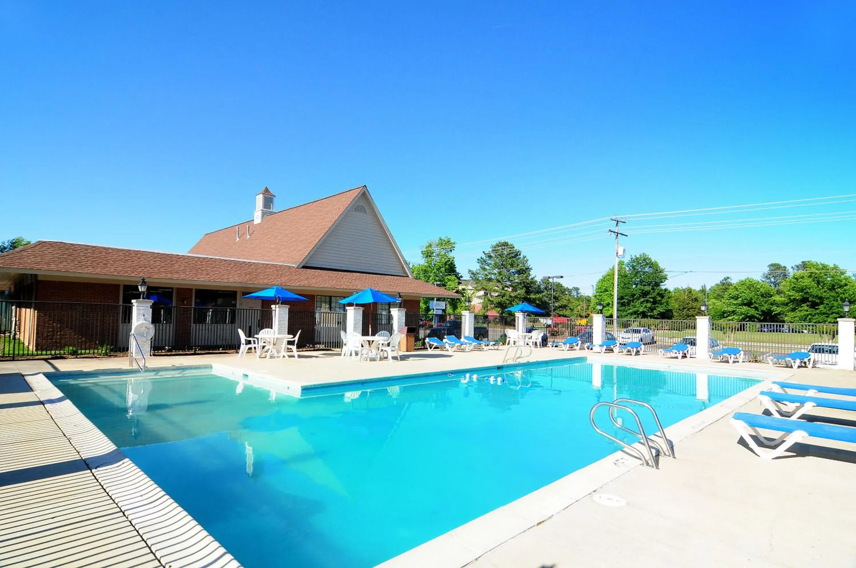 Day, Swimming Pool in Days Inn & Suites by Wyndham Colonial