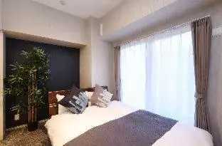 View (from property/room), Bed in Residence Hotel Hakata 19