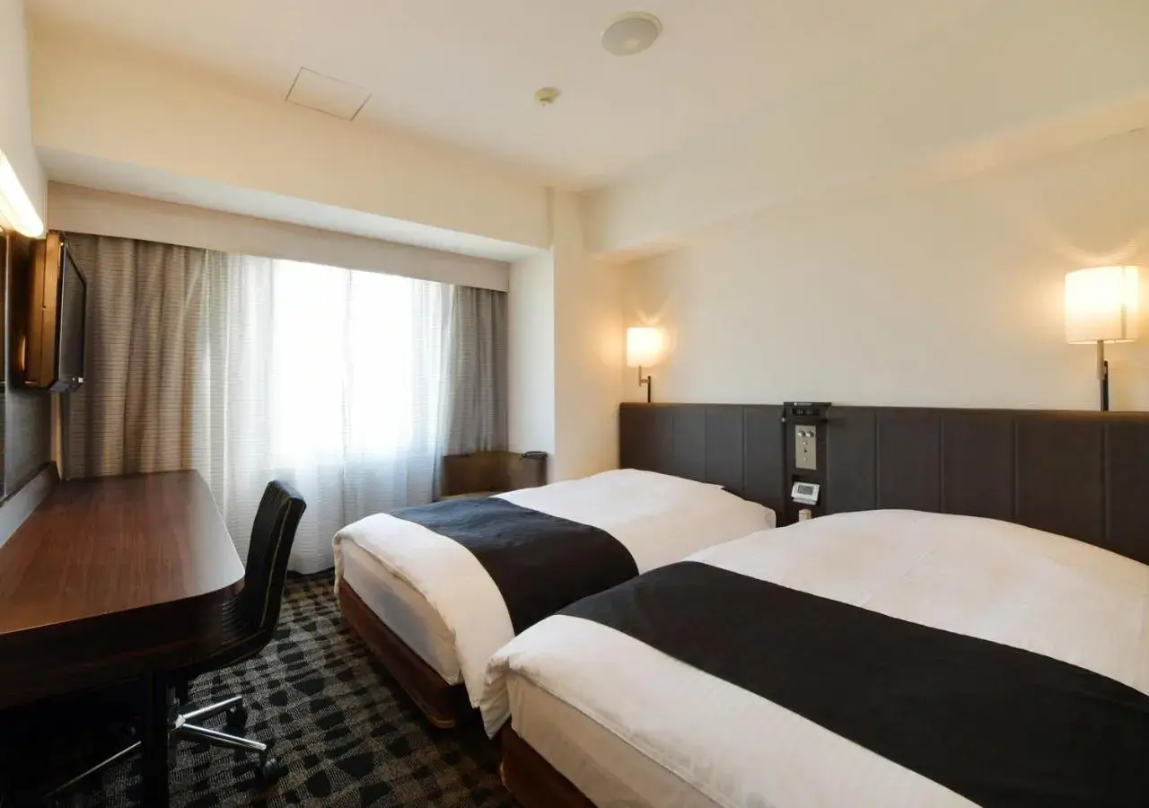 Photo of the whole room, Bed in APA Hotel Nagoya Sakae