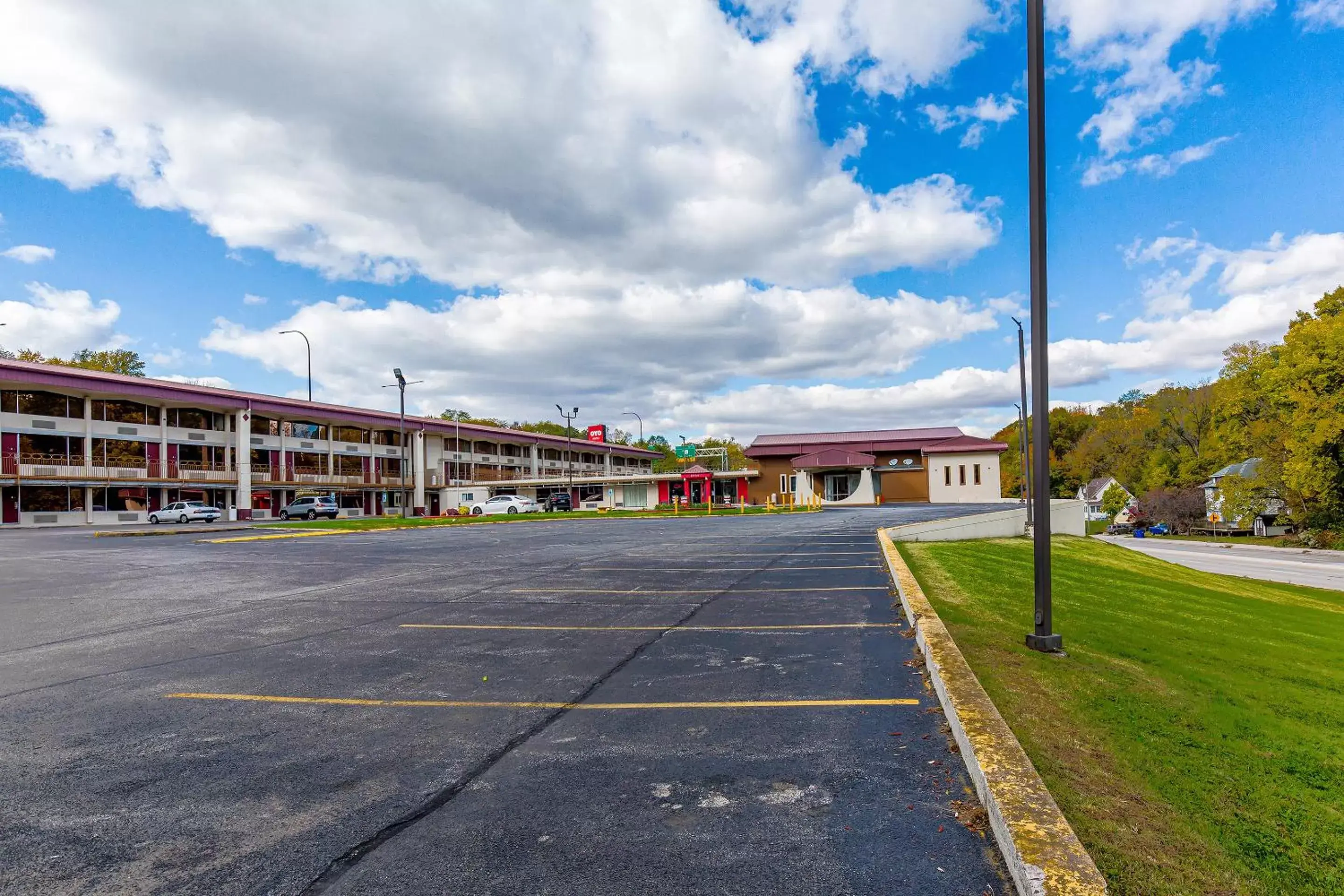 Parking, Property Building in OYO Hotel Moline Downtown IL I-74 North