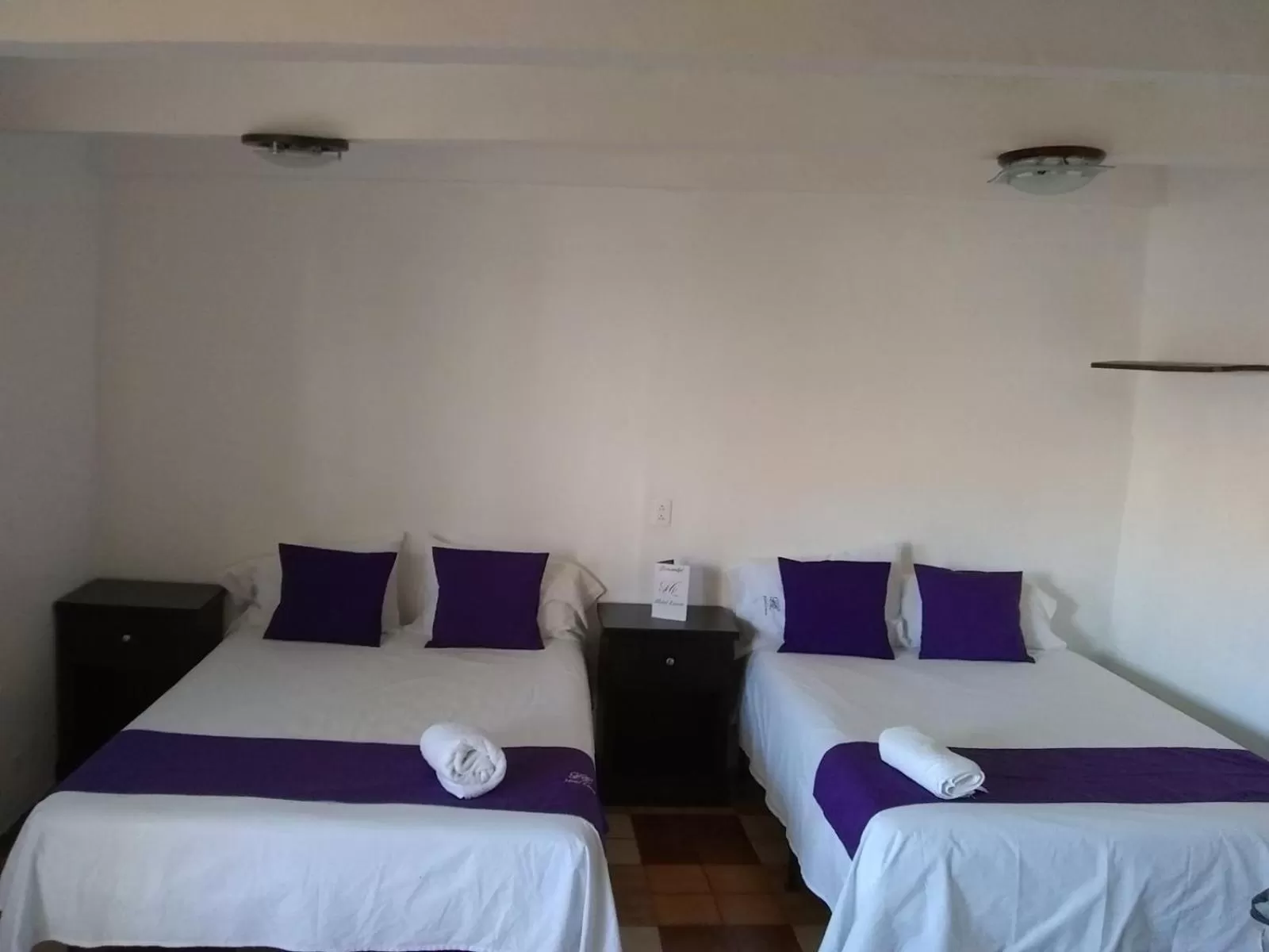 Bed in Hotel Posada Laura