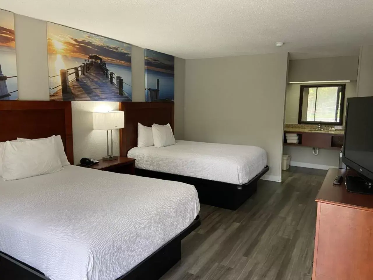 Bed in Days Inn by Wyndham Ozark