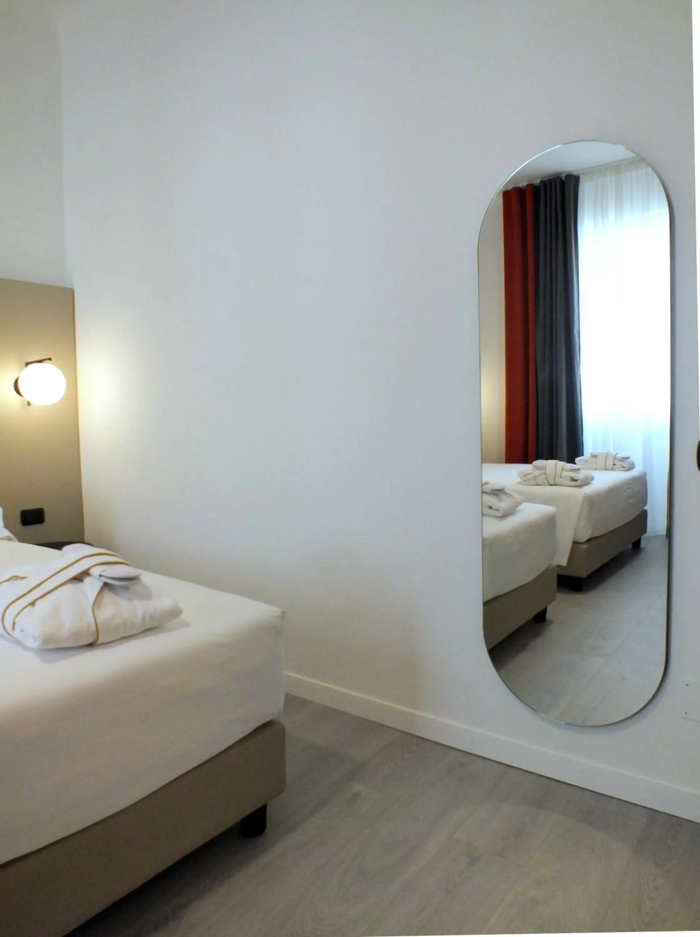 Bed in BB Hotels Smarthotel Derose