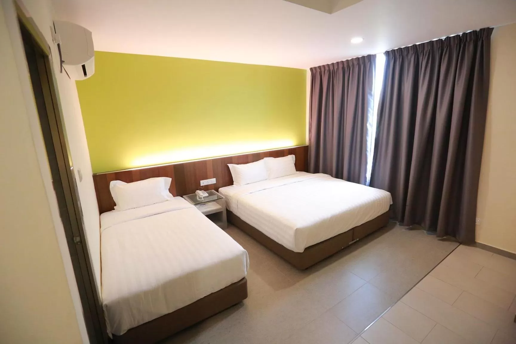 Bed in Pantai Regal Boutique Hotel