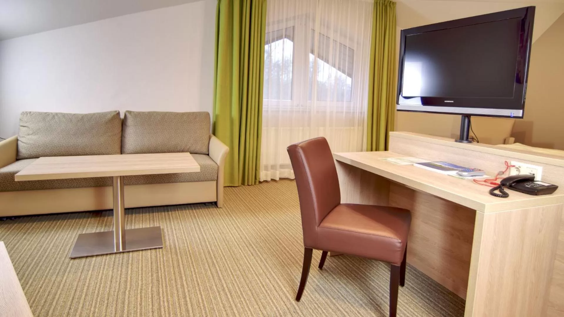 Living room, TV/Entertainment Center in Hotel Heilemann