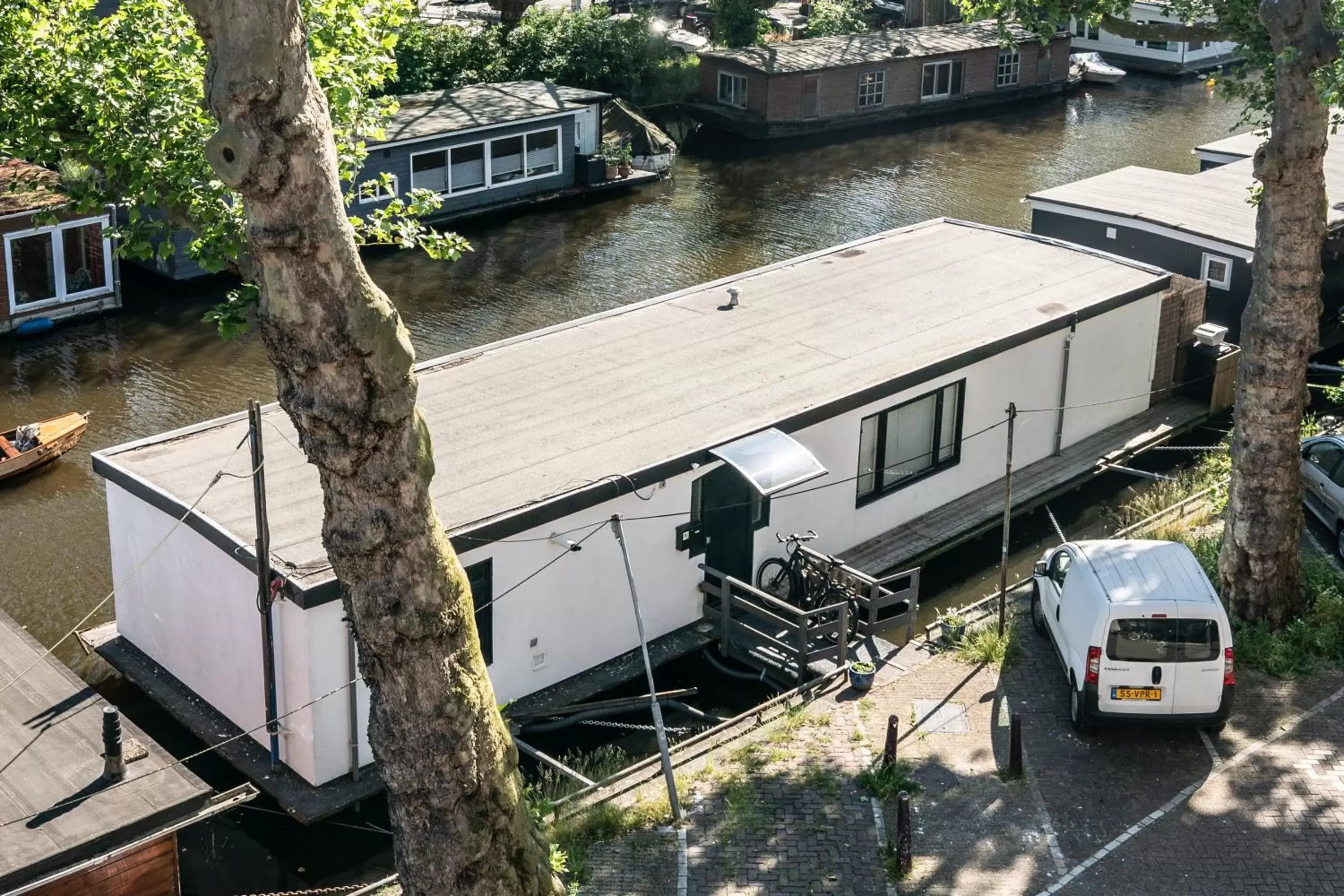 Property building in Amsterdam Houseboat amstel