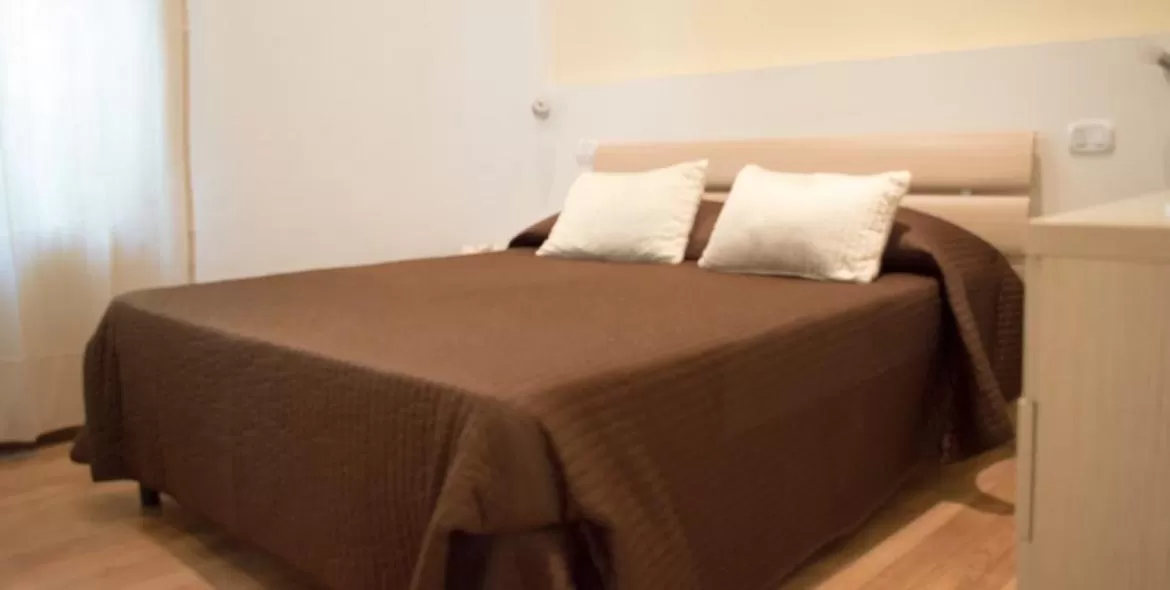 Bed in Guerrini Hotel