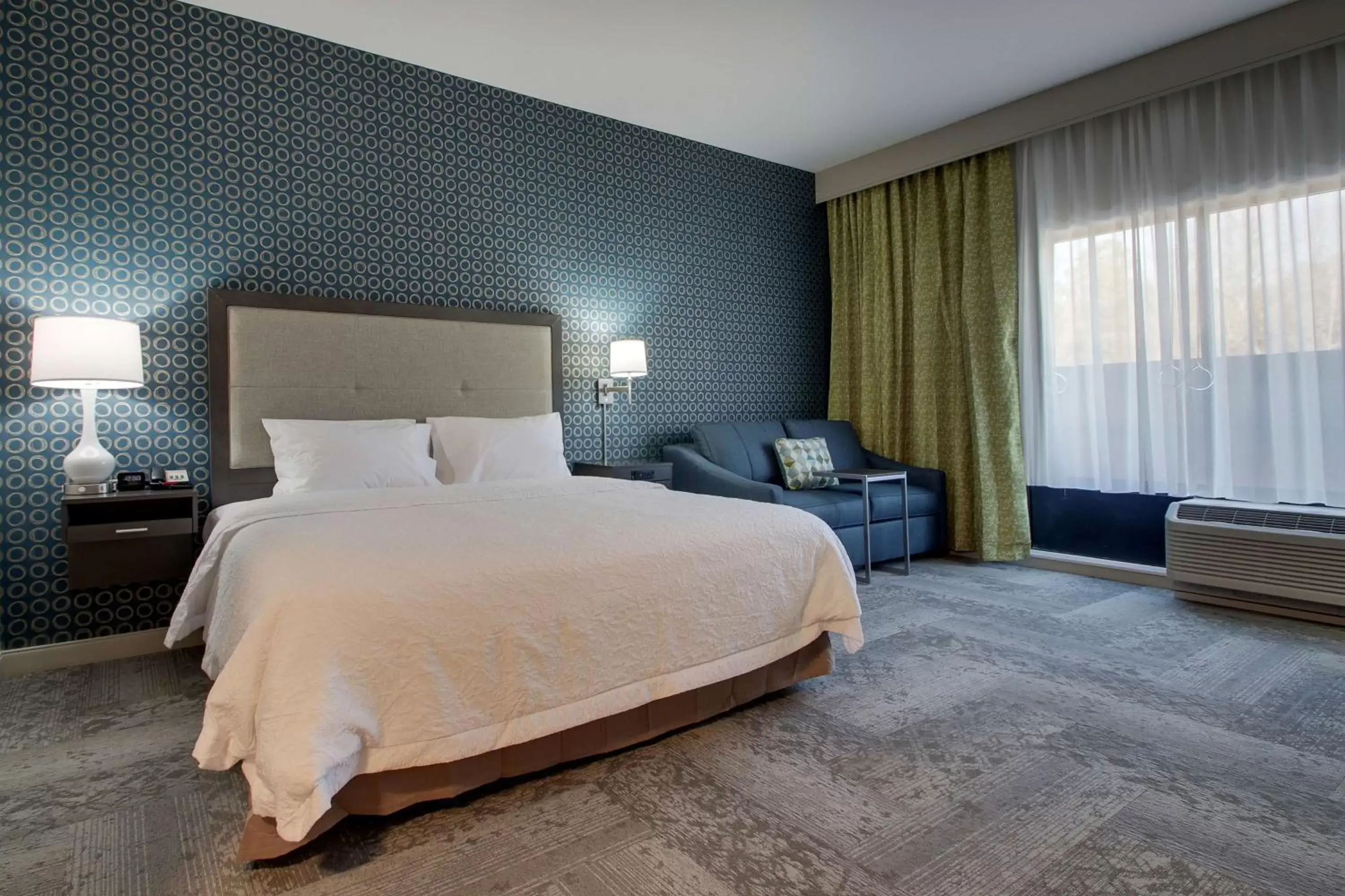 Living room, Bed in Hampton Inn & Suites By Hilton Knightdale Raleigh Living room, Bed in Hampton Inn & Suites By Hilton Knightdale Raleigh