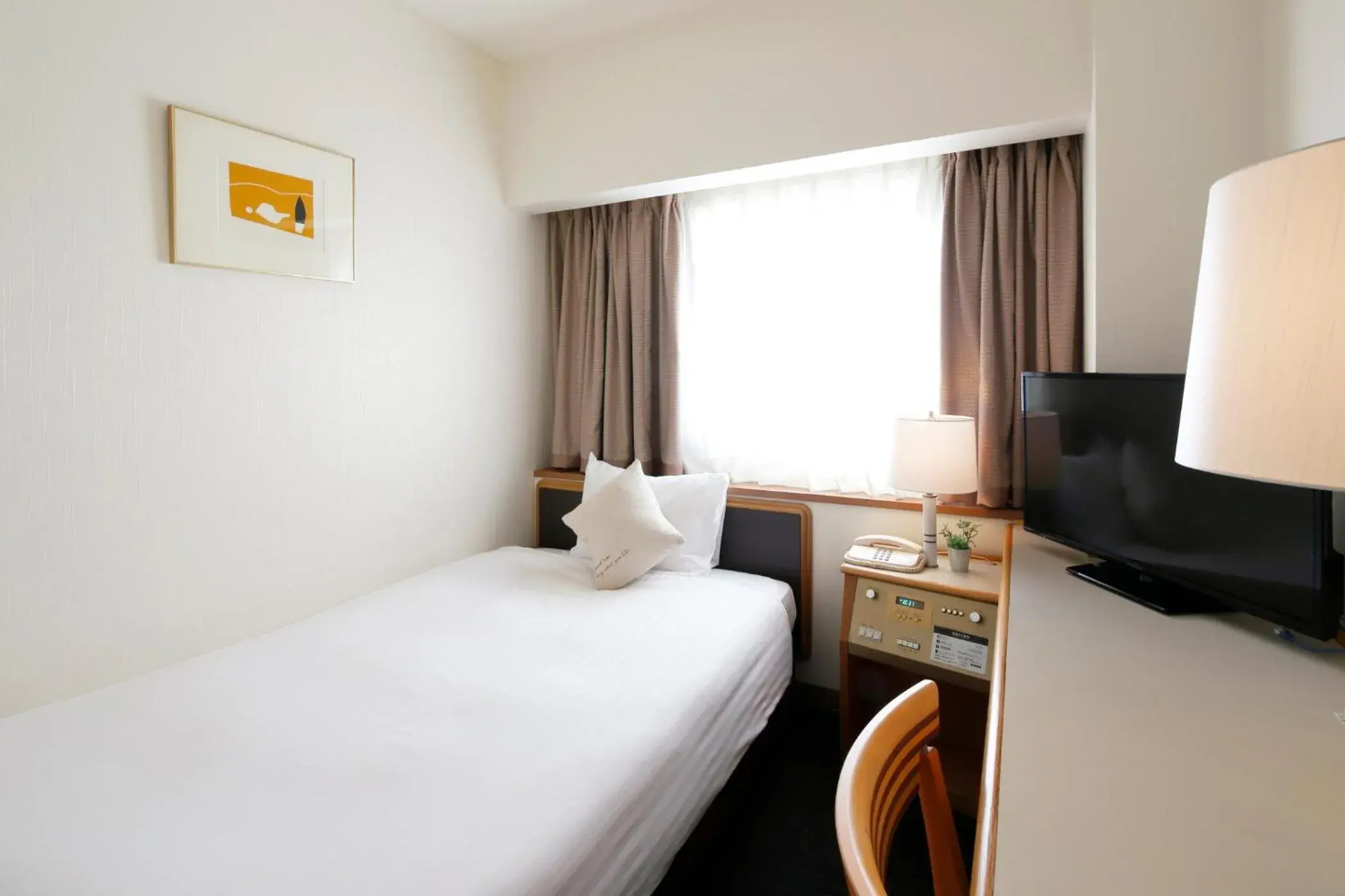 Bed in Hotel Resol Sasebo
