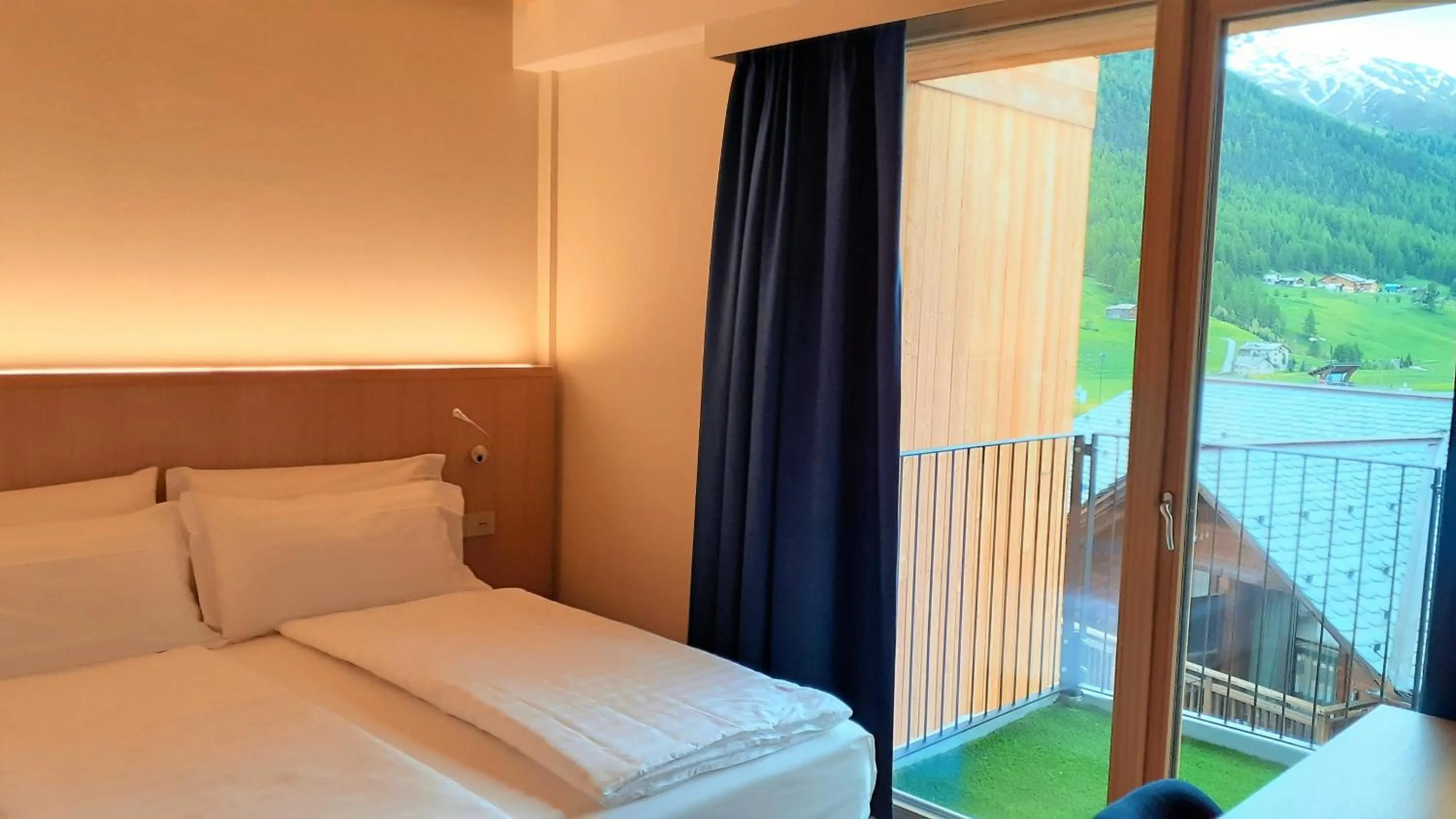 Bed in Livì Family Hotel