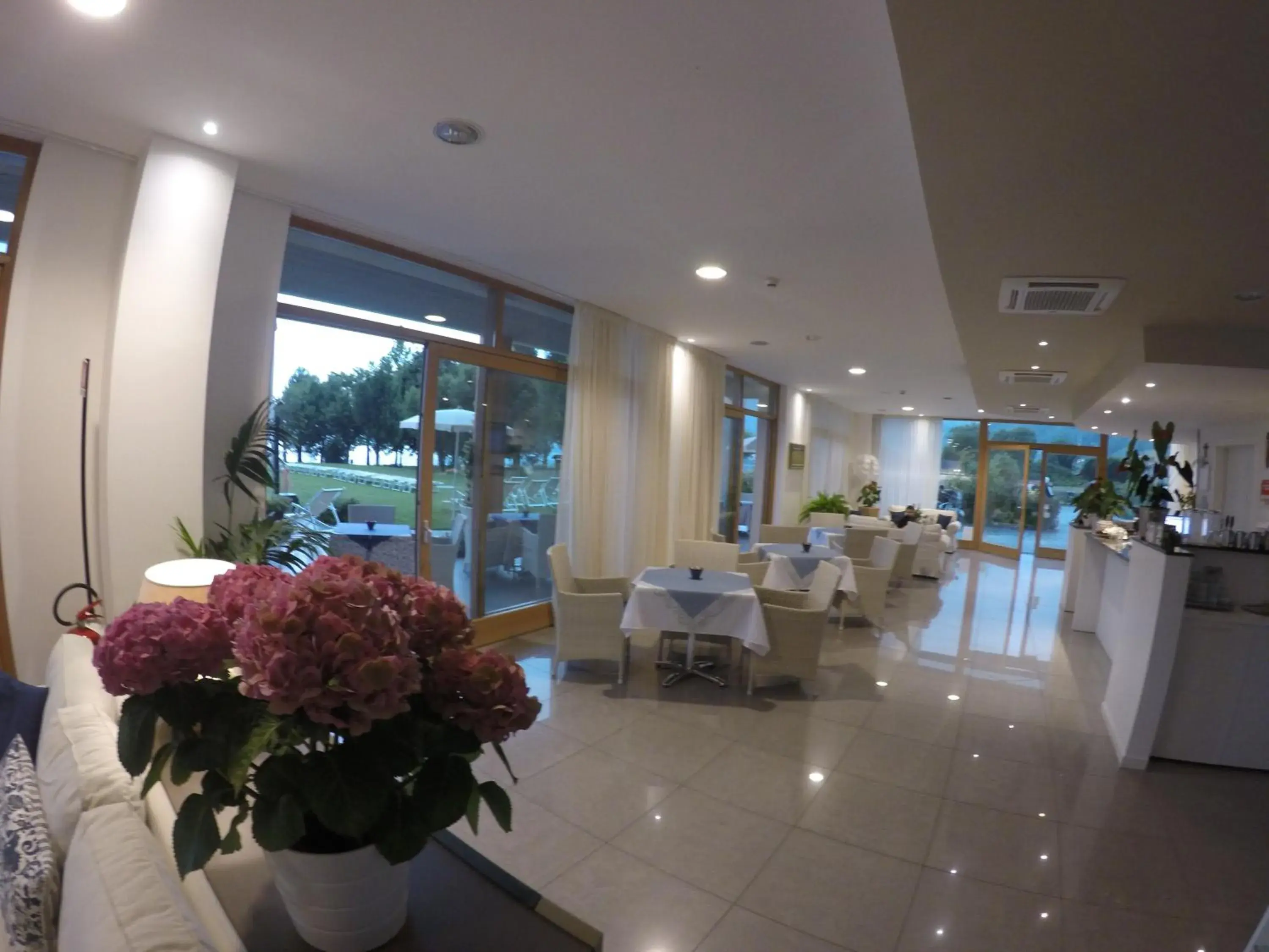 Communal lounge/ TV room, Restaurant/Places to Eat in Tullio Hotel