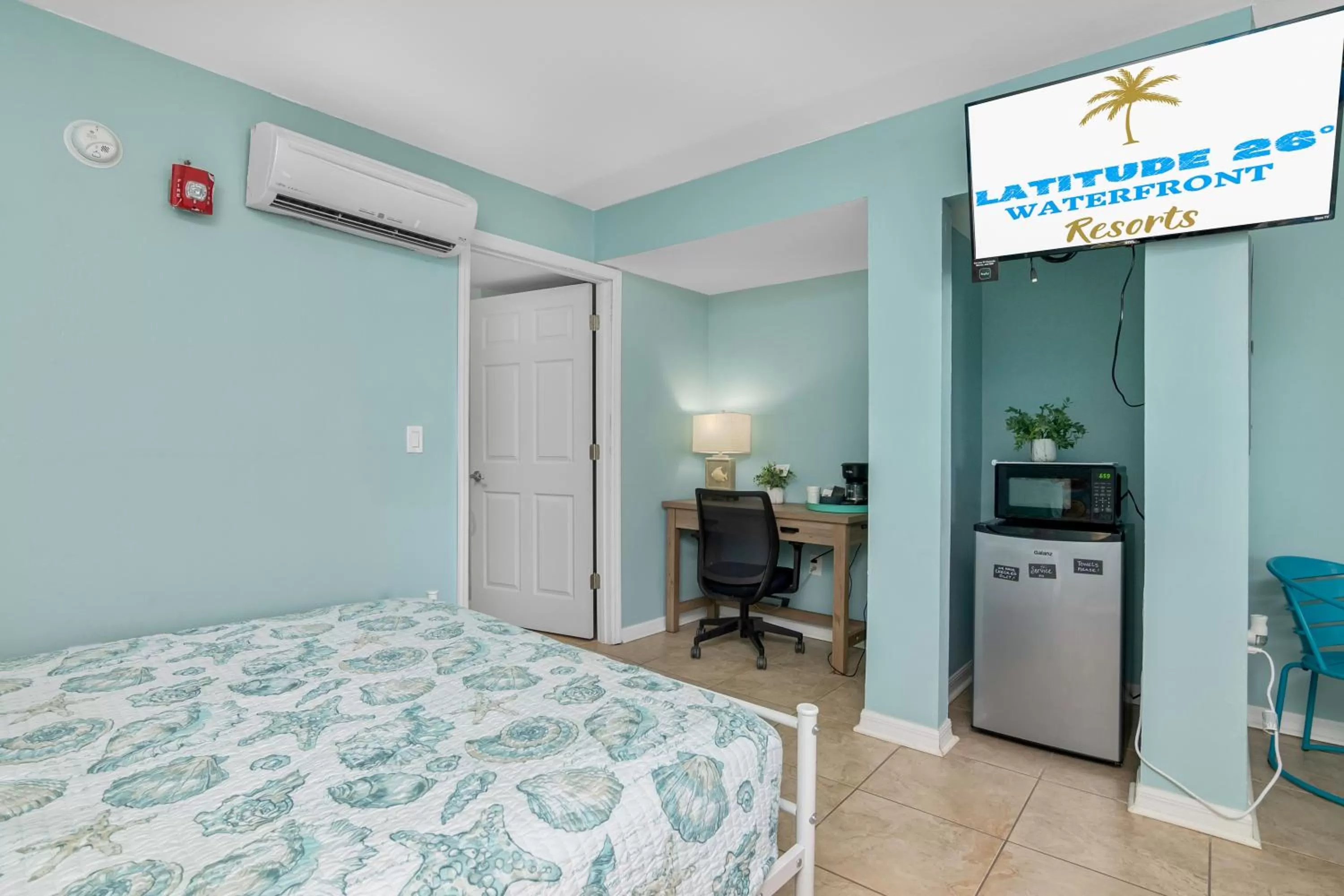 Bedroom, Bed in Latitude 26 Waterfront Resort and Marina