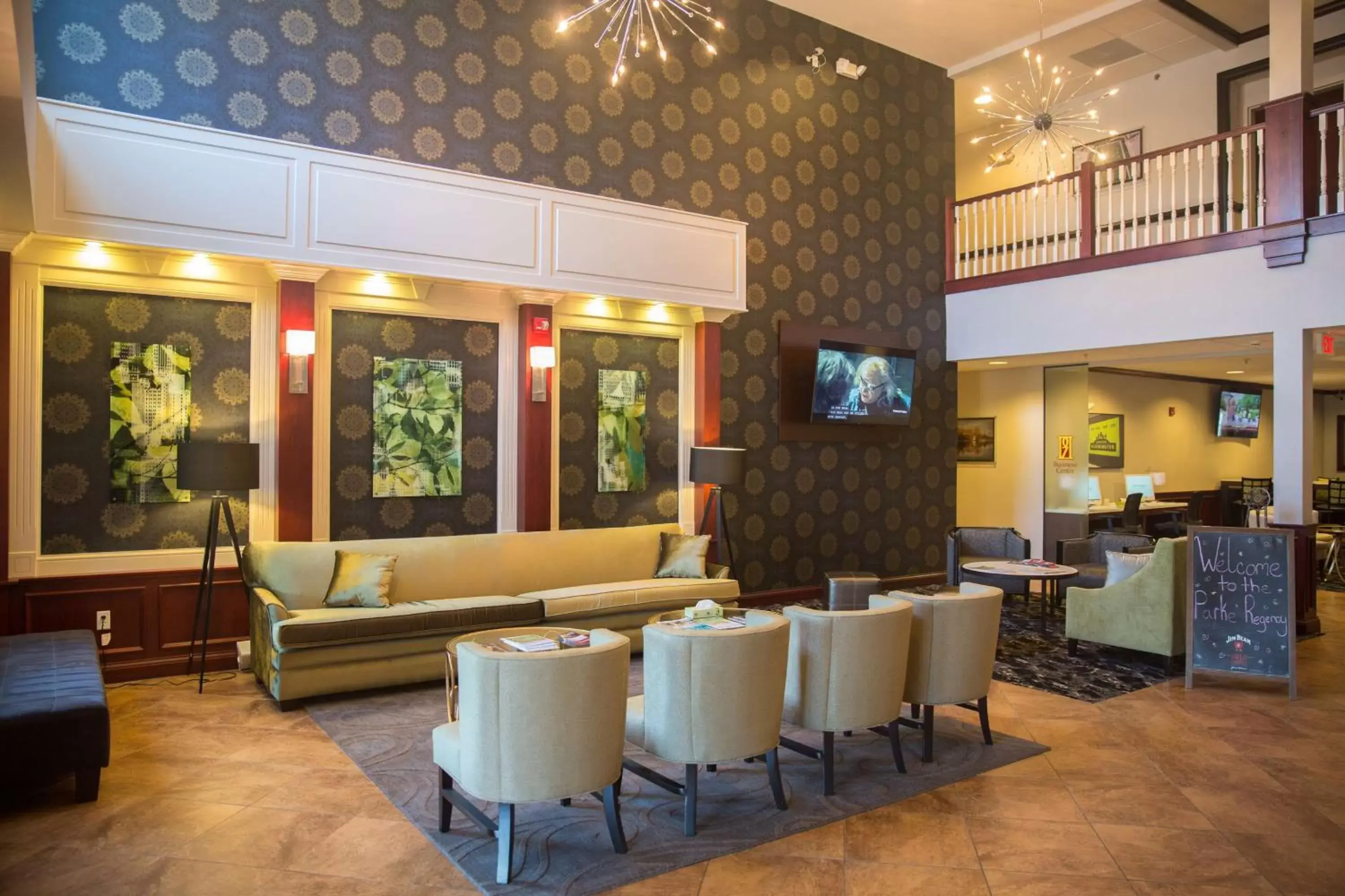 Communal lounge/ TV room, Lobby/Reception in Parke Regency Hotel & Conf Ctr., BW Signature Collection