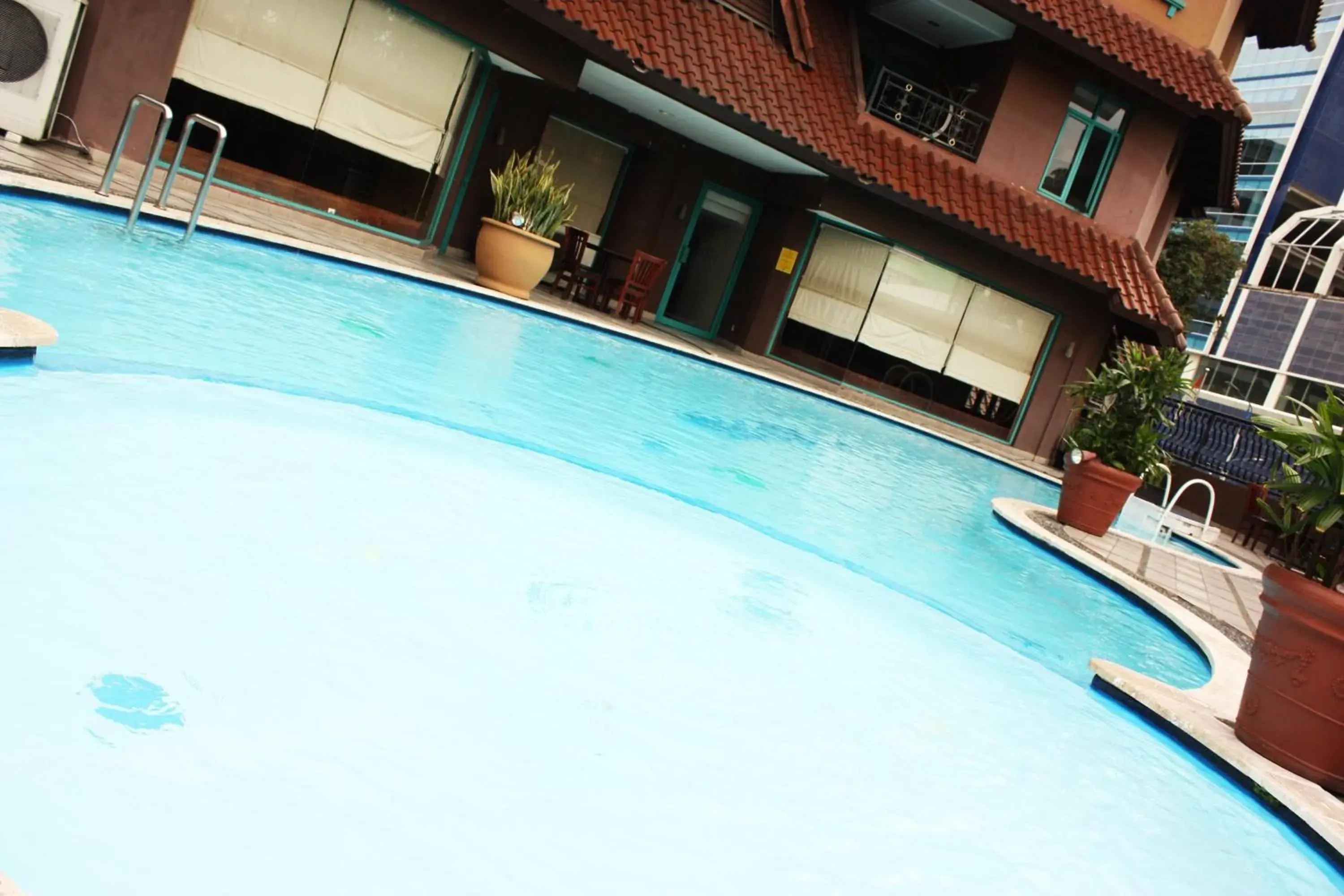 Swimming Pool in Travellers Suites Serviced Apartments