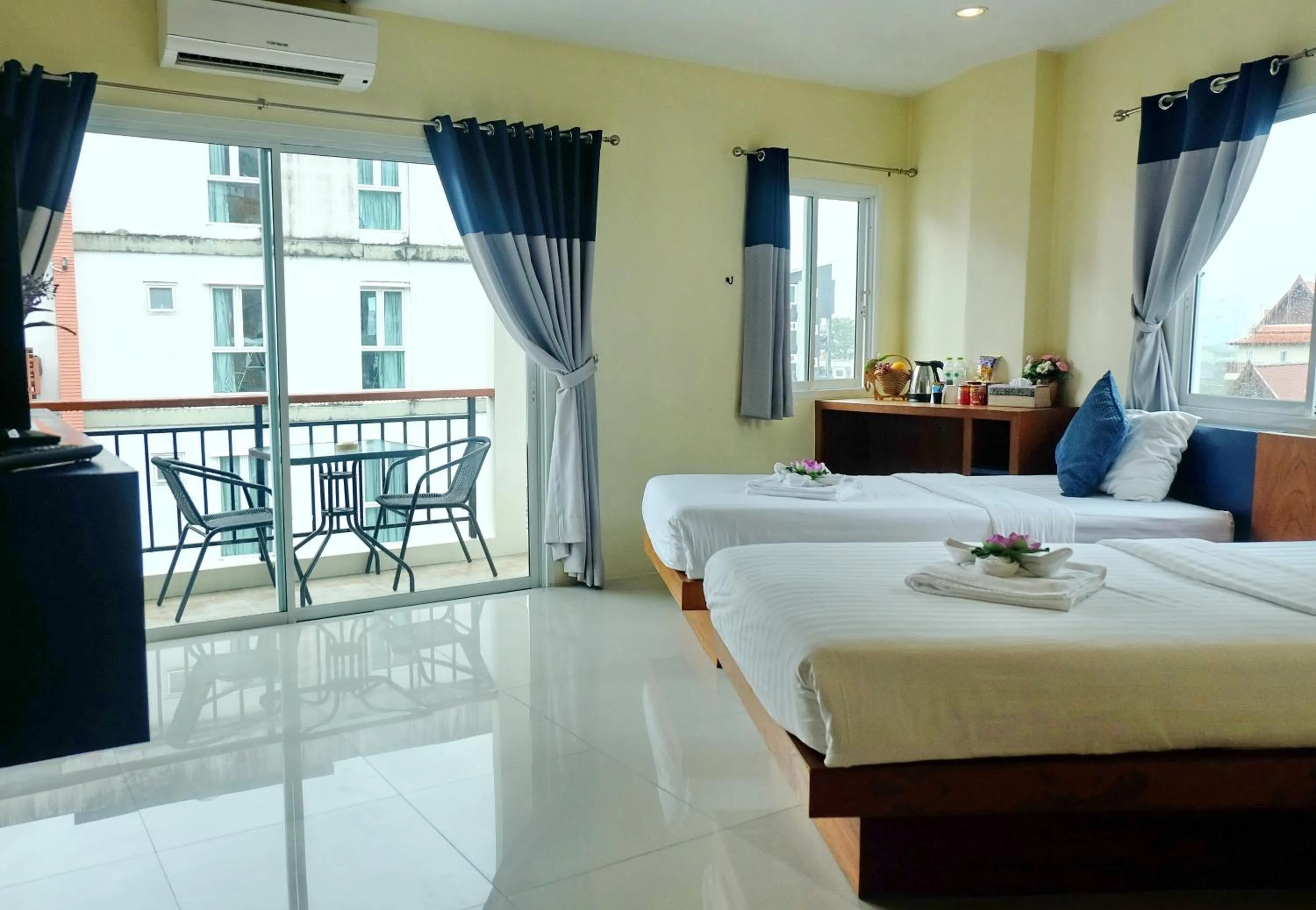 Bed in Calypso Patong Hotel