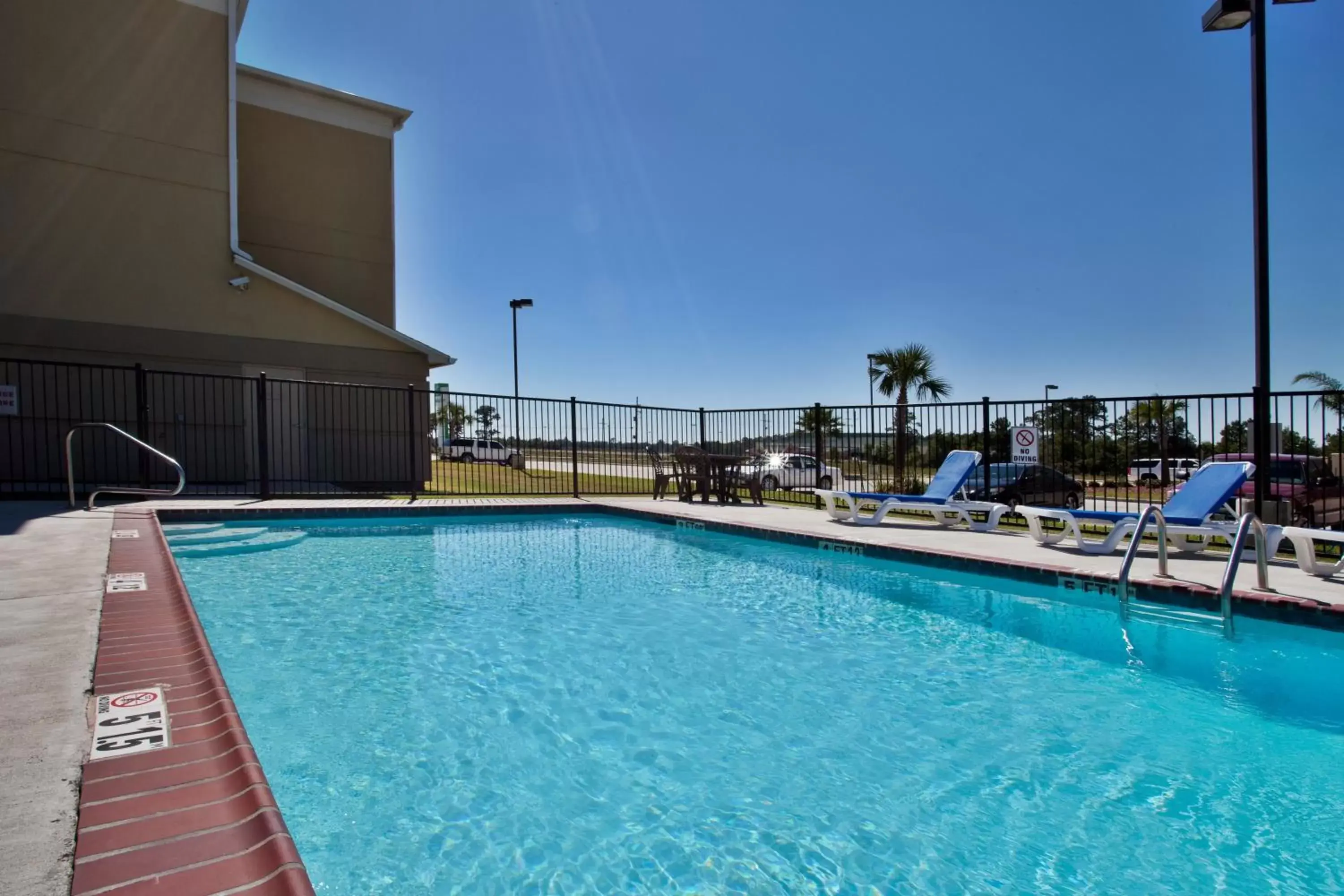 Swimming Pool in Candlewood Suites Lake Charles-Sulphur, an IHG Hotel