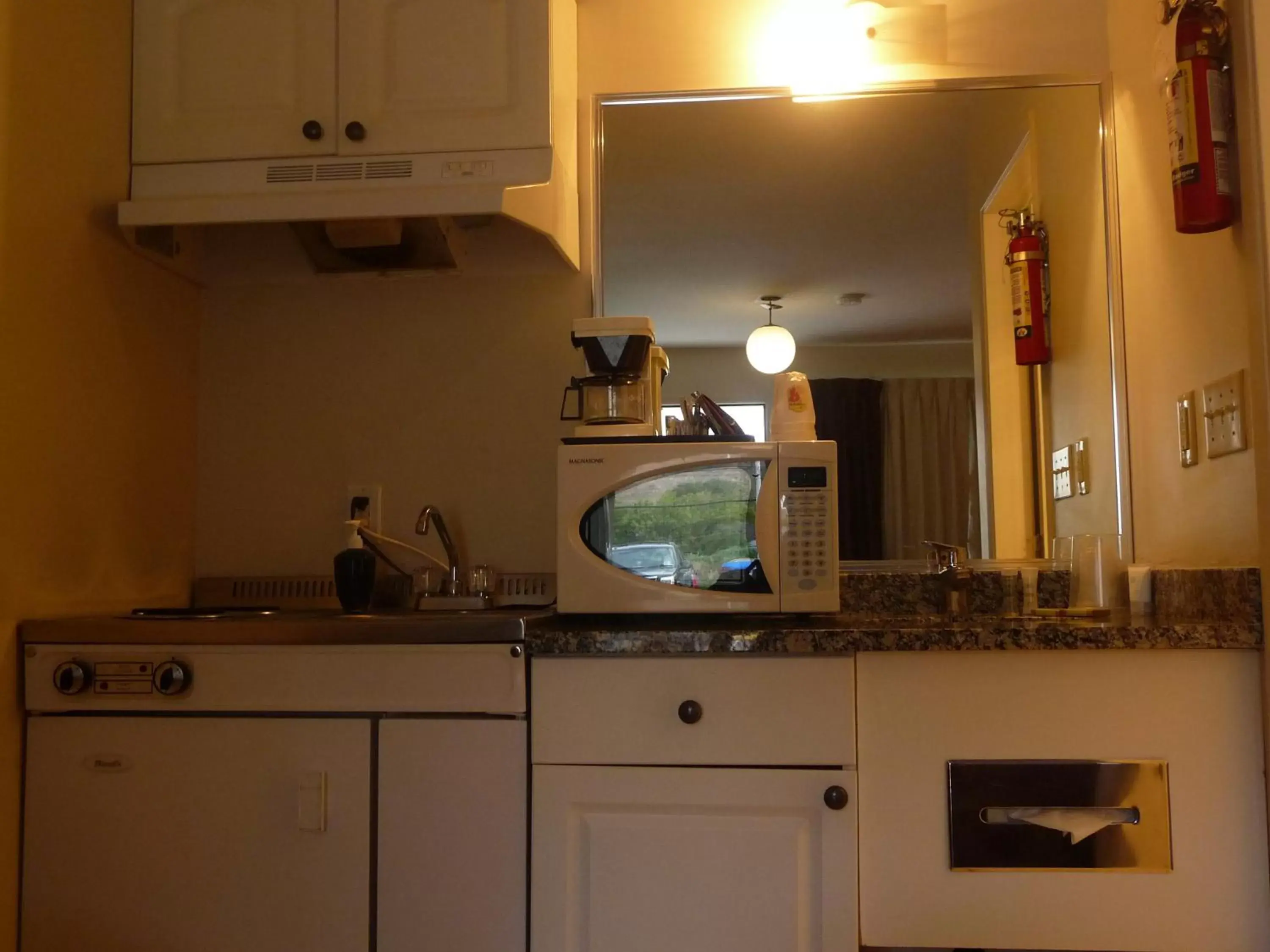 Kitchen or kitchenette, Kitchen/Kitchenette in Super 8 by Wyndham Kamloops East