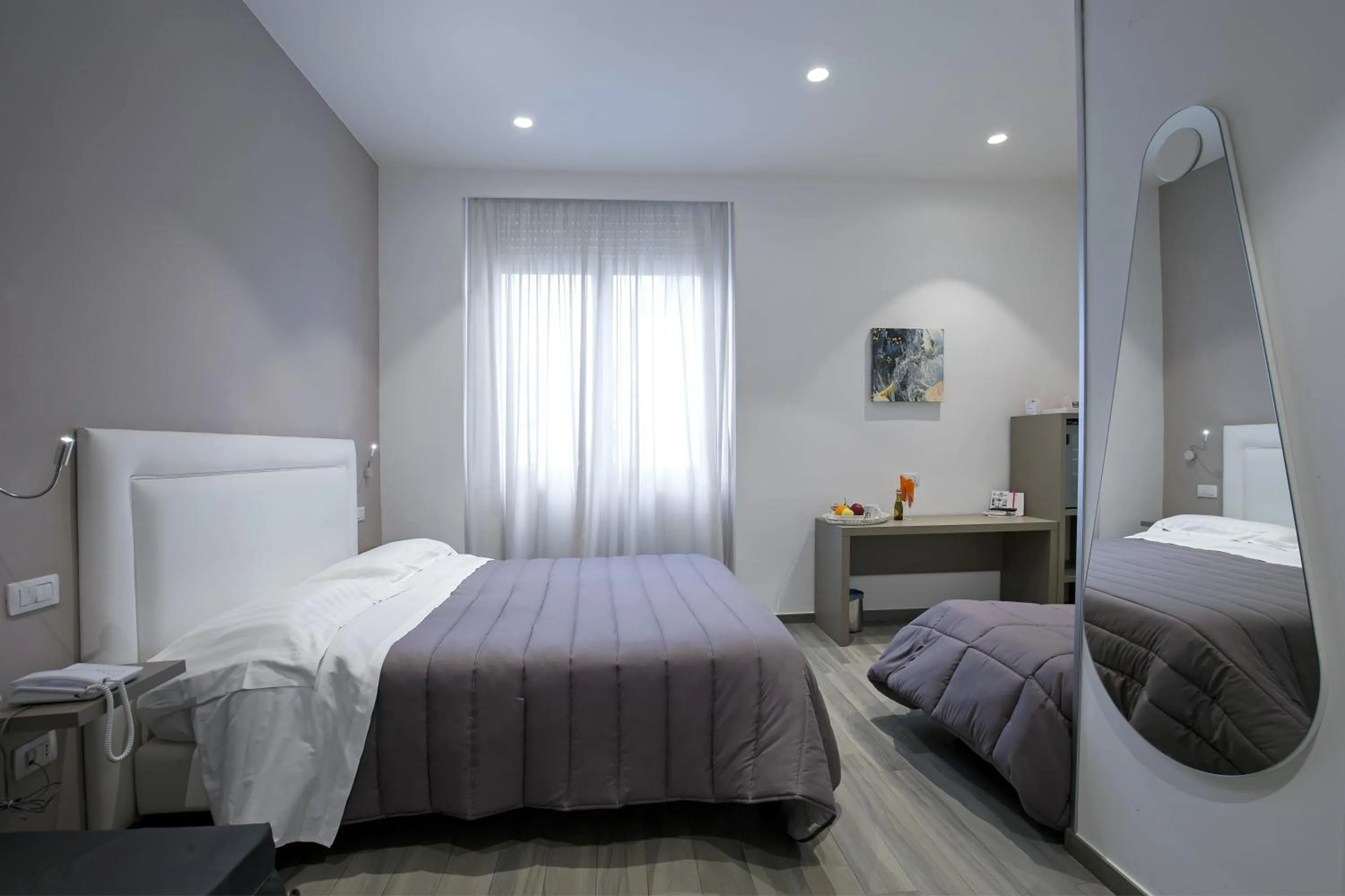 Photo of the whole room, Bed in Hotel Bruman Salerno