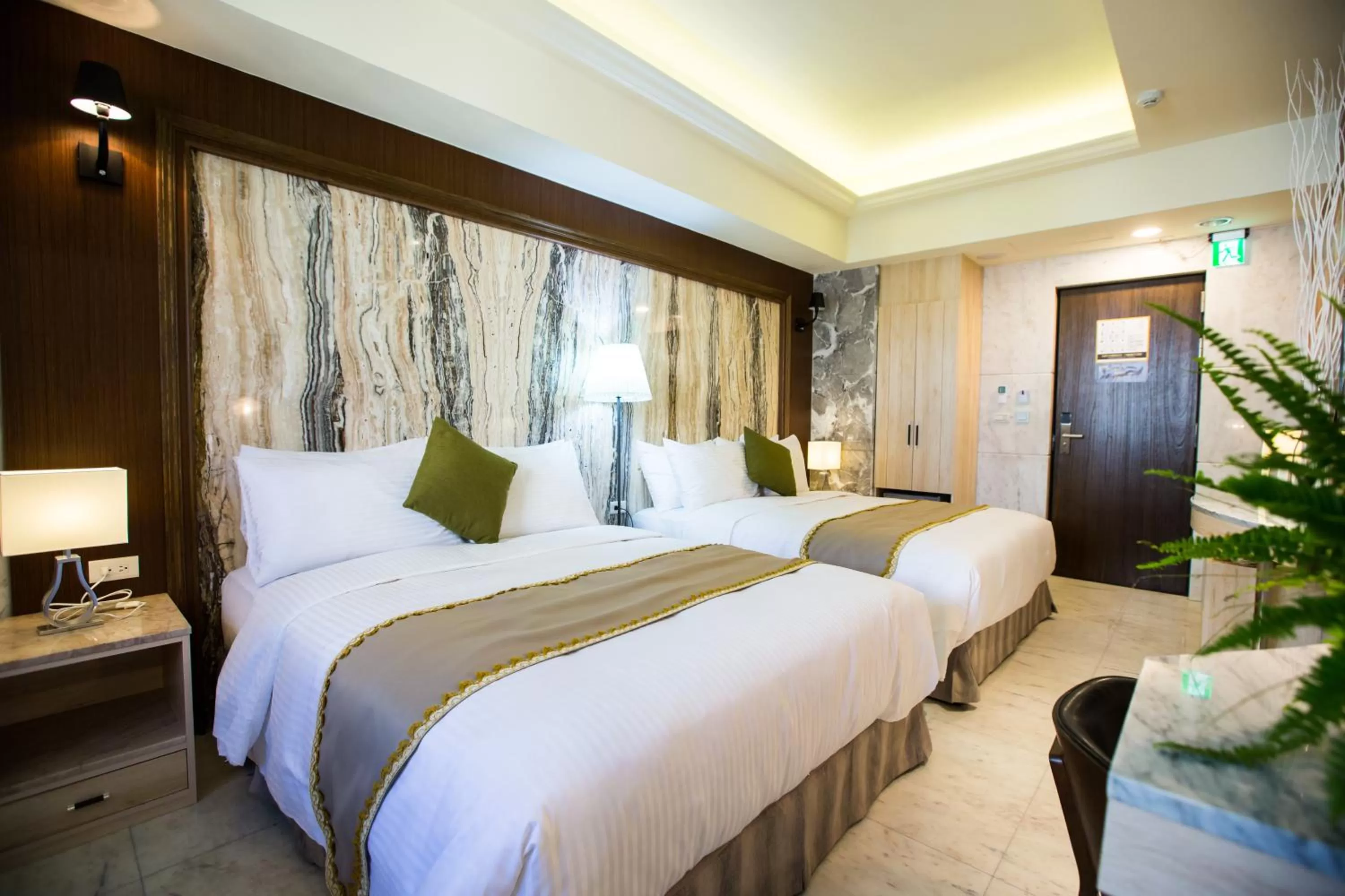 Bed in Hotel Maple Taiwan Boulevard