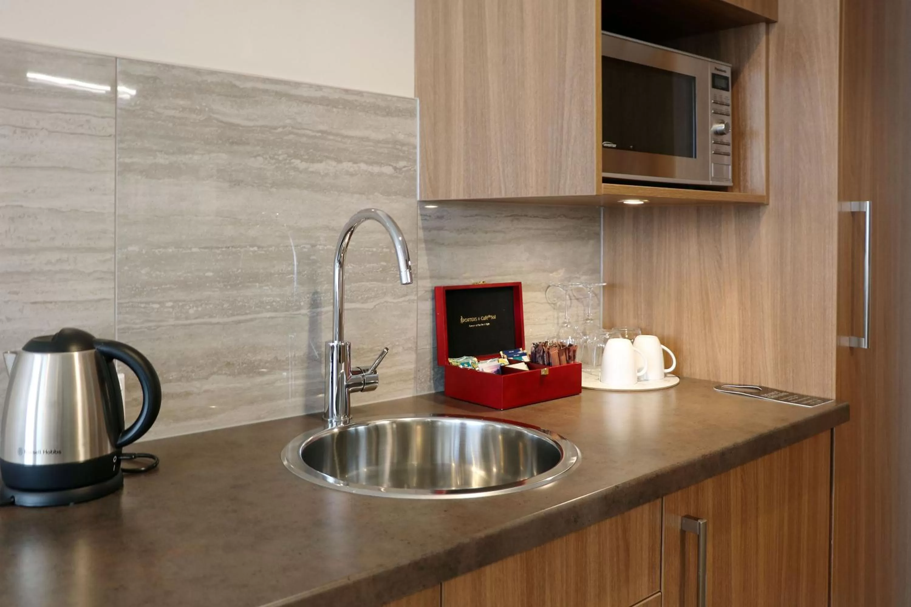 Kitchen or kitchenette in The Victoria Hotel Dunedin