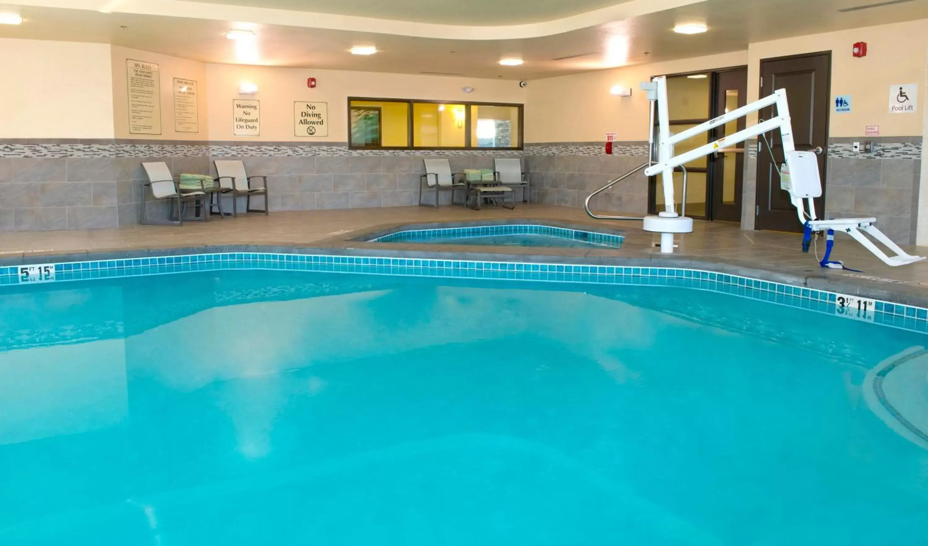 Swimming Pool in Holiday Inn Express & Suites Colorado Springs Central, an IHG Hotel