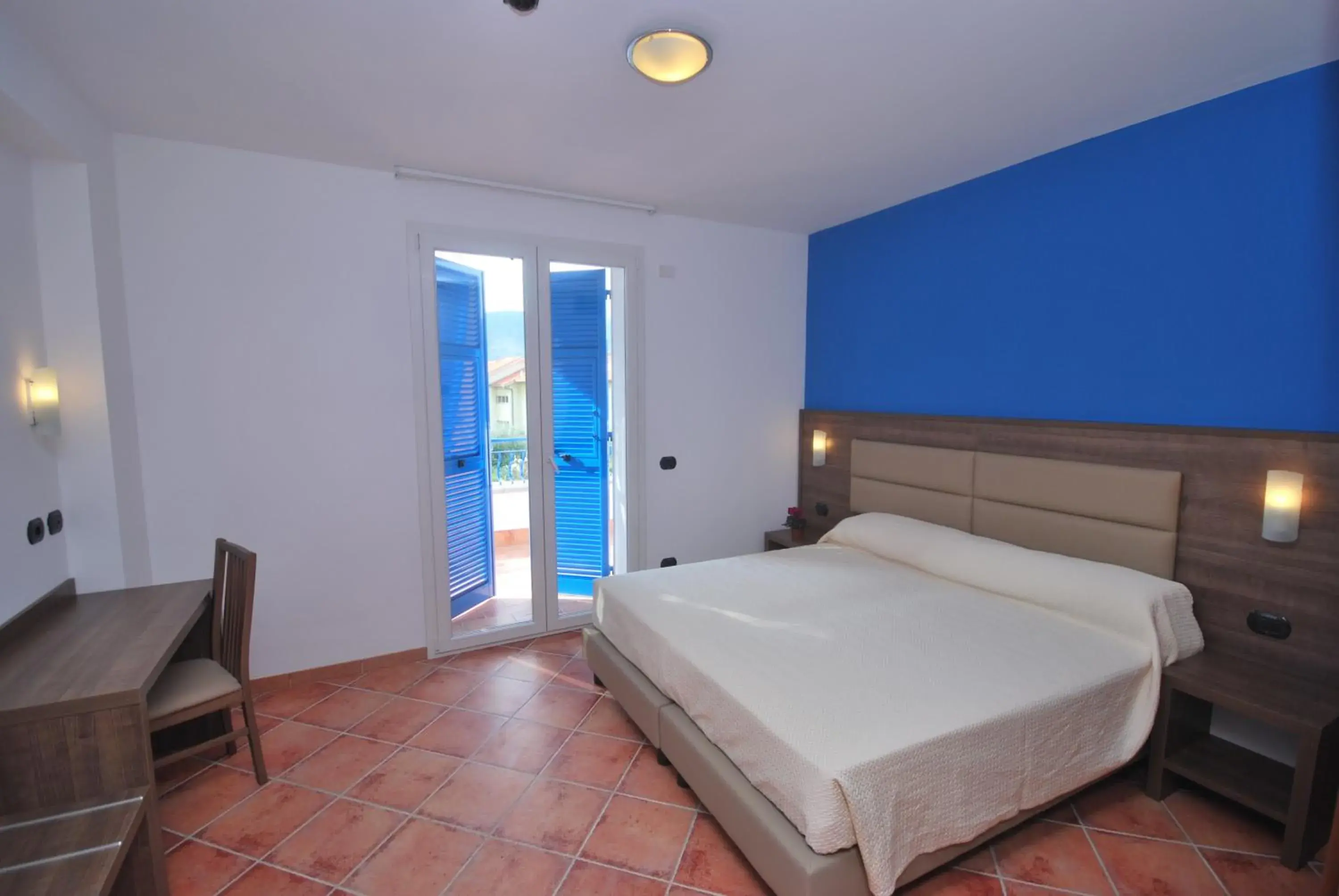 Photo of the whole room, Bed in Ai Pozzi Village Hotel & Resort