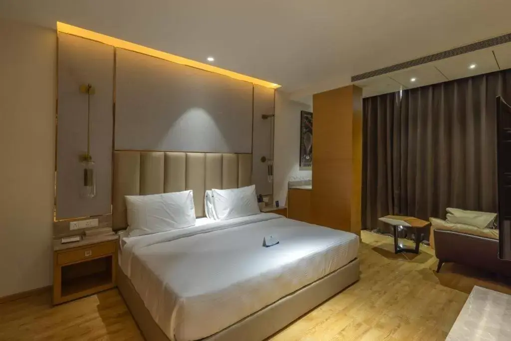 Bedroom, Bed in Sarovar Portico Morbi