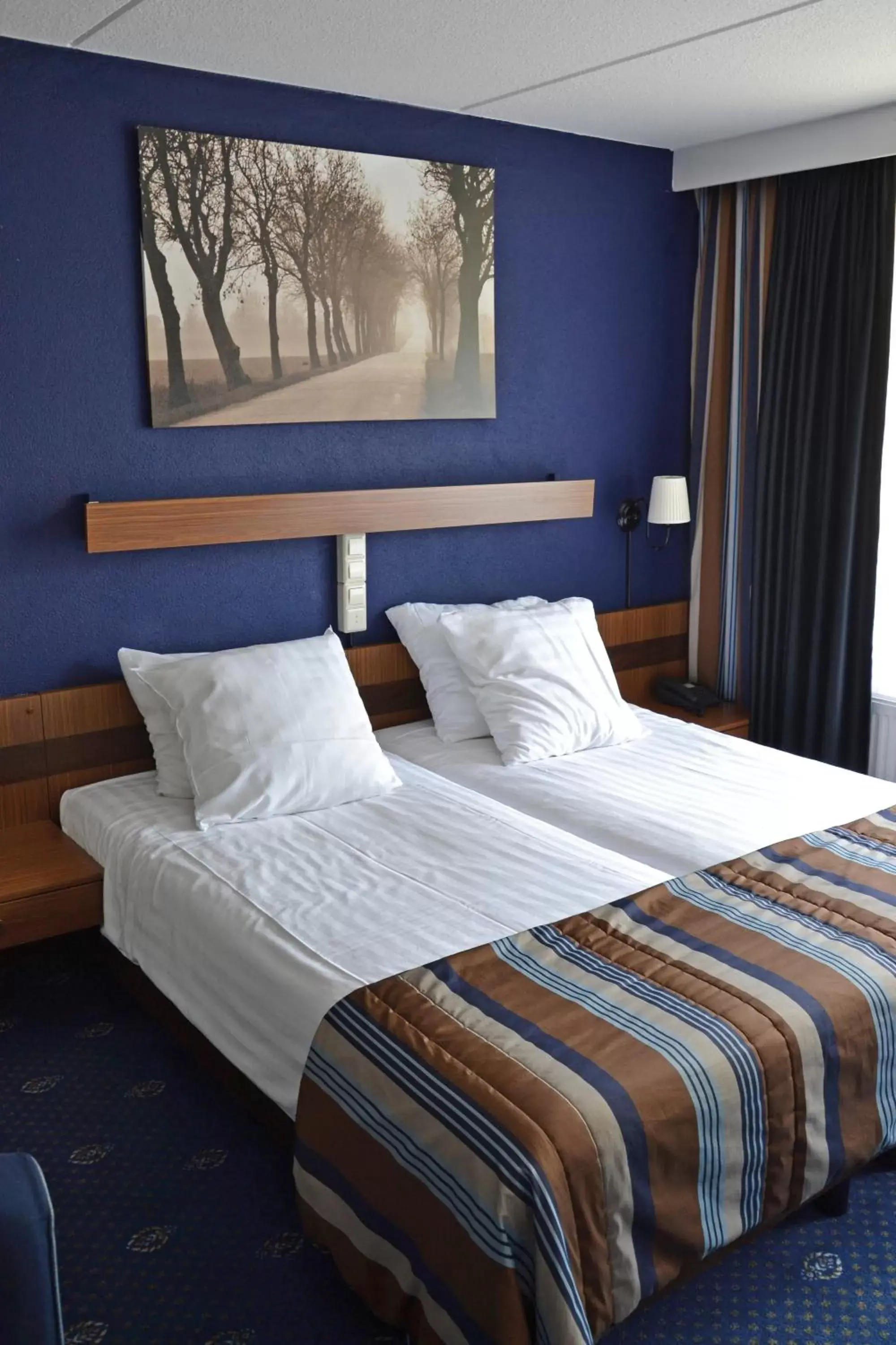 Bed in Fletcher Hotel - Restaurant Heiloo