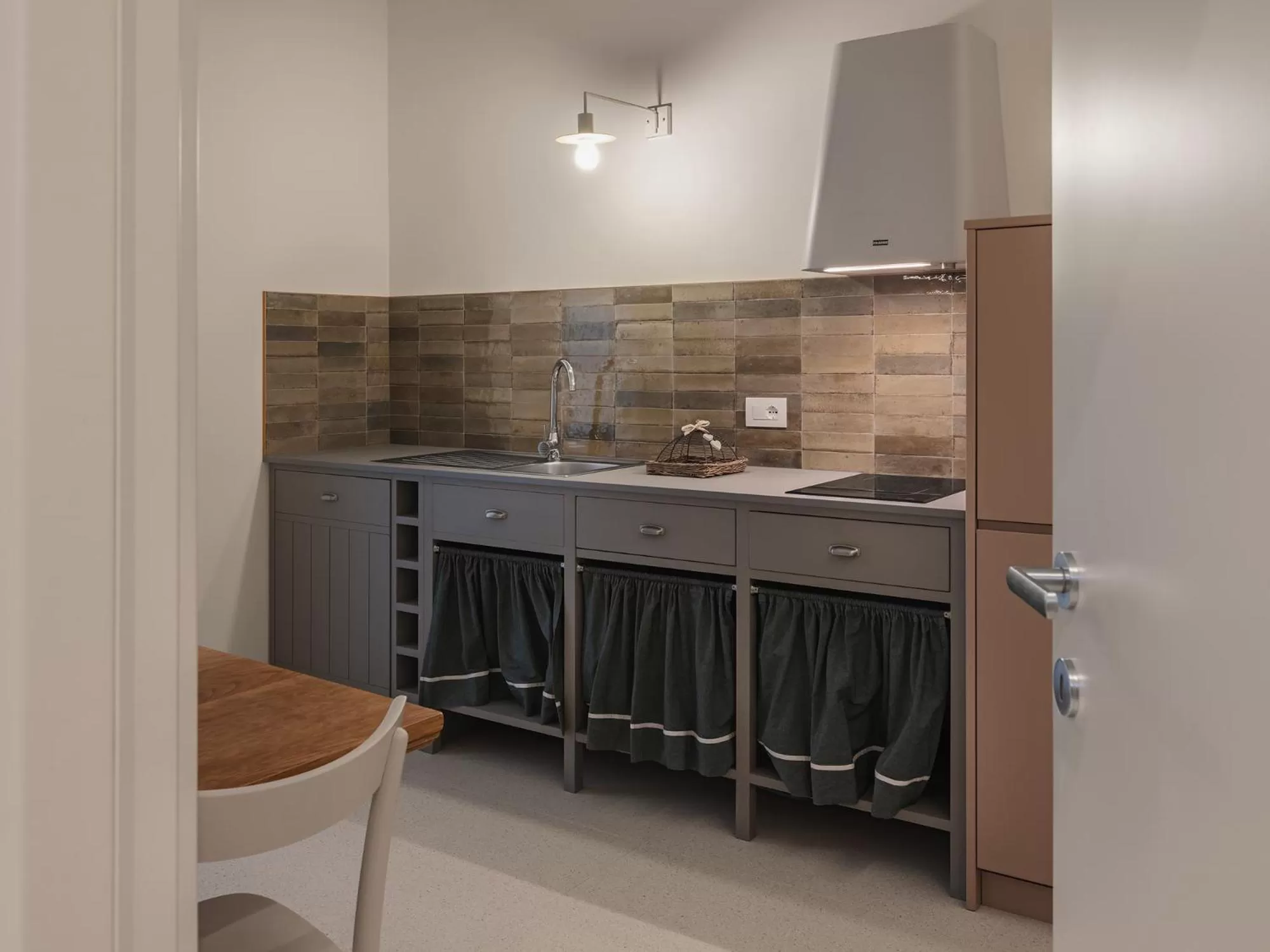 Kitchen or kitchenette in Living u HomeSuites
