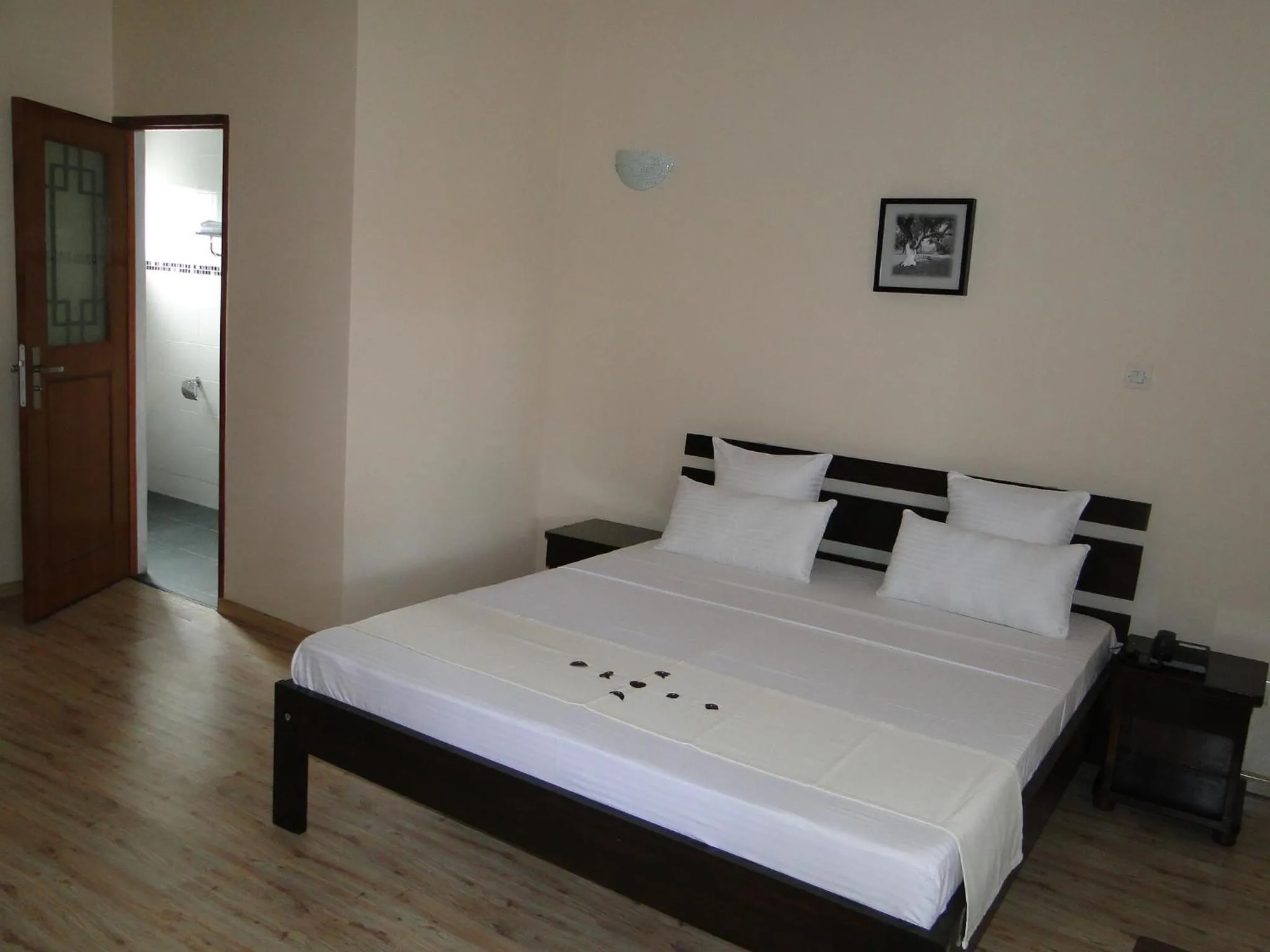 Photo of the whole room, Bed in Hotel H1 Antsirabe